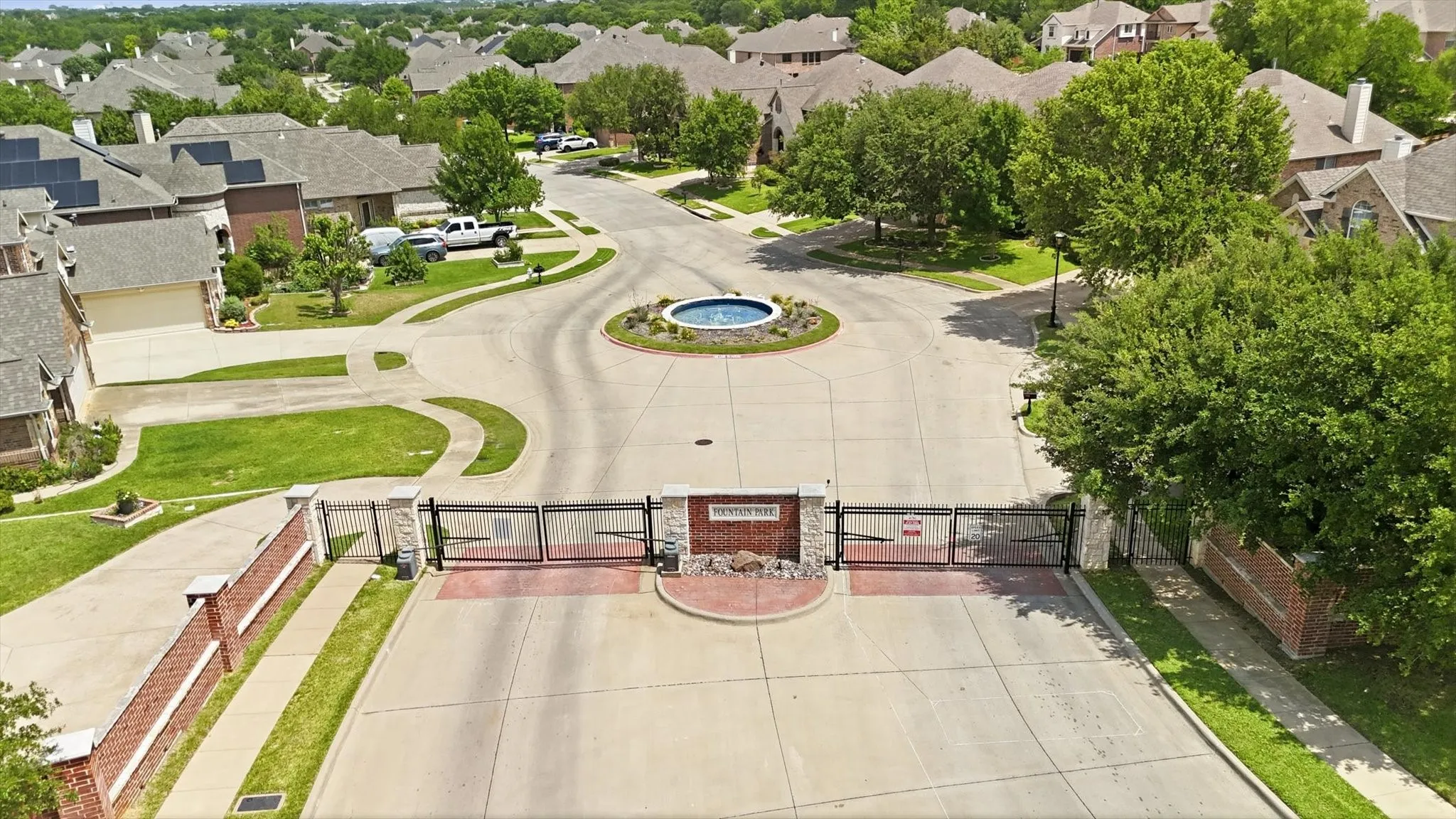 Entrance to the coveted Fountain Park gated community.