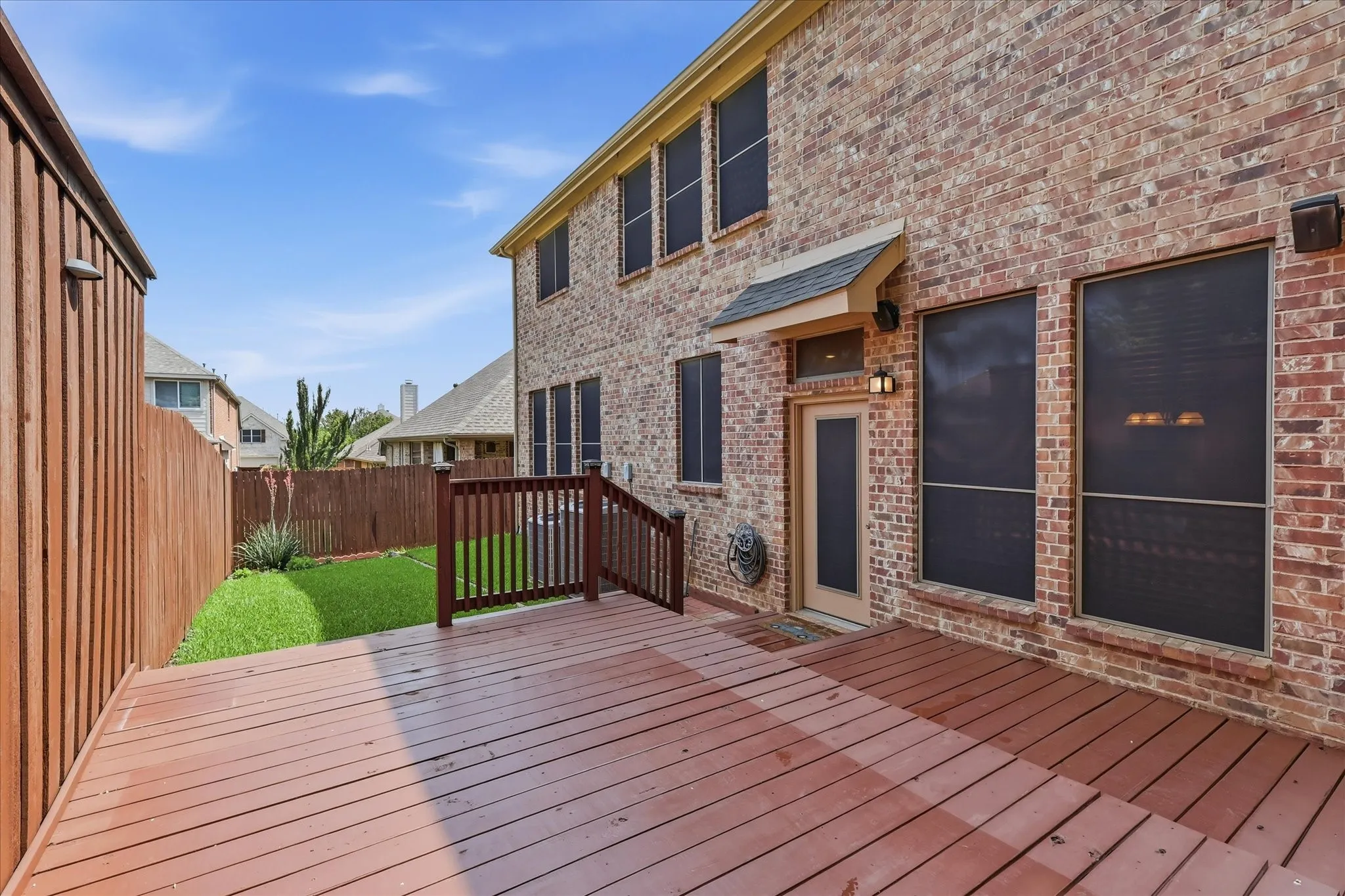 Wonderful multi-level deck provides privacy and extends the living space outdoors. Perfect place to relax and unwind. Off to the side, there is a barbeque pit area - perfect for keeping grills out of sight.