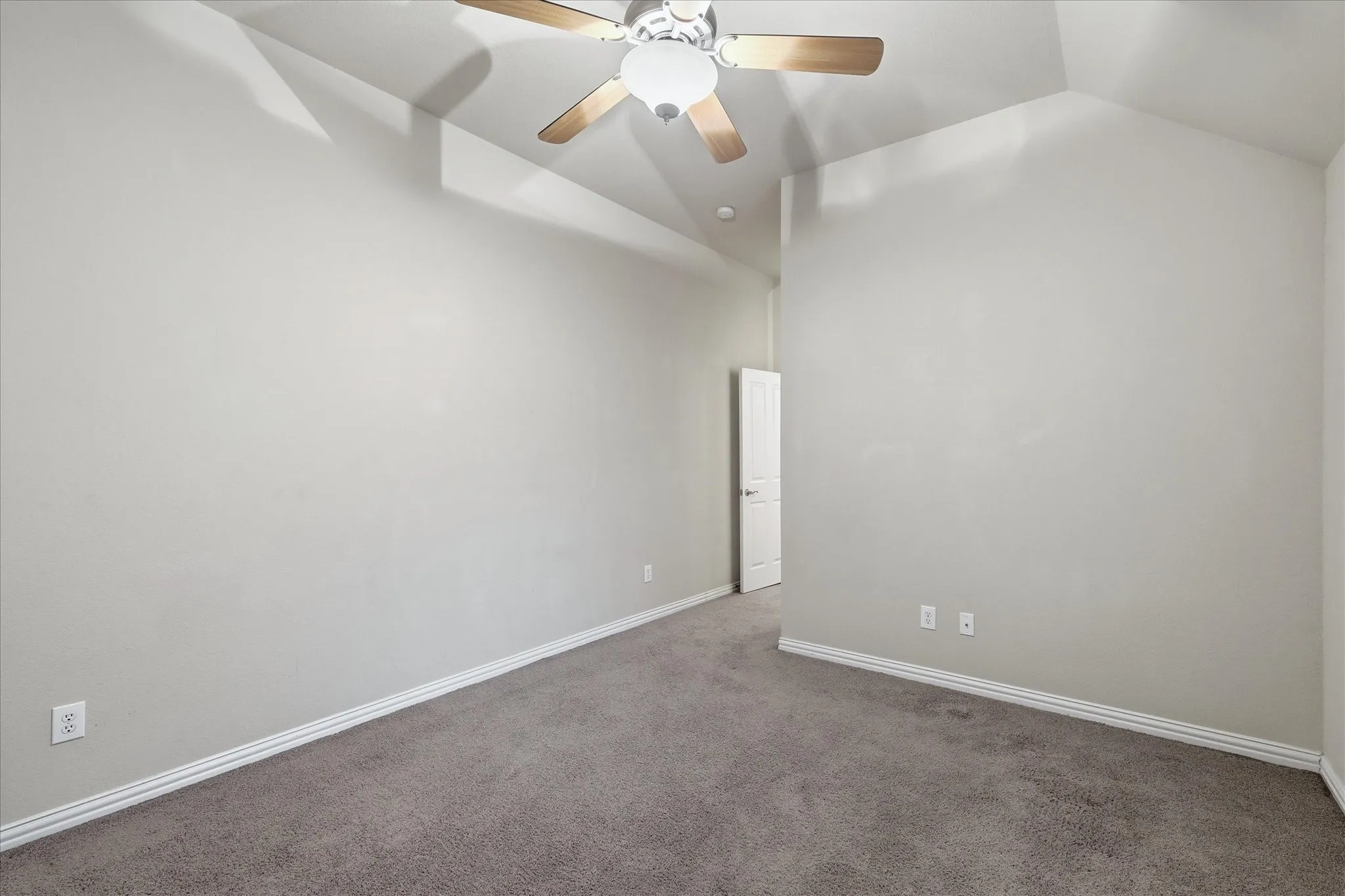 Spacious secondary bedroom with access to the second Jack-n-Jill bathroom.