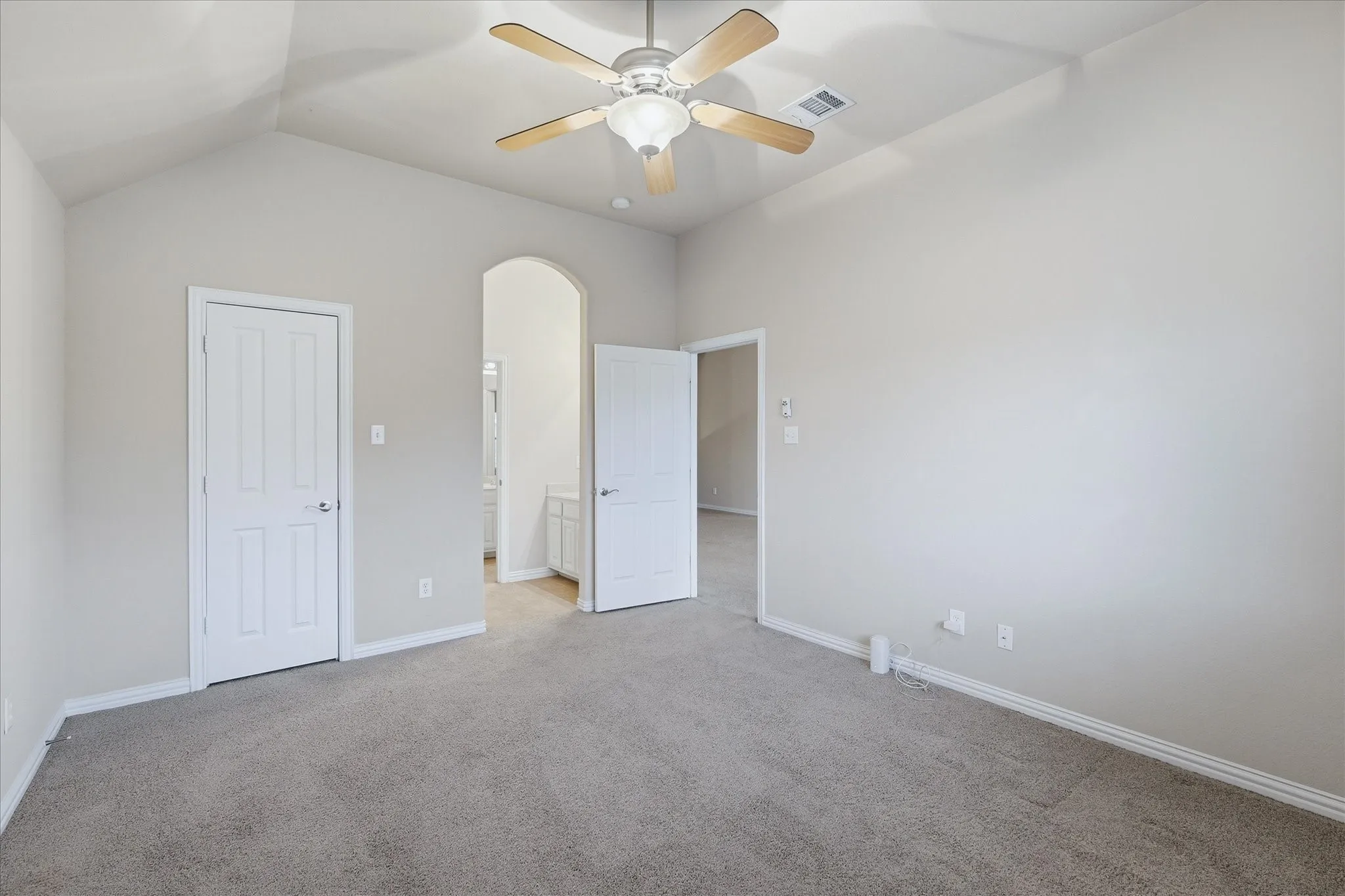 Secondary bedroom that opens to the Jack-n-Jill bathroom. All bedrooms feature walk-in closets.