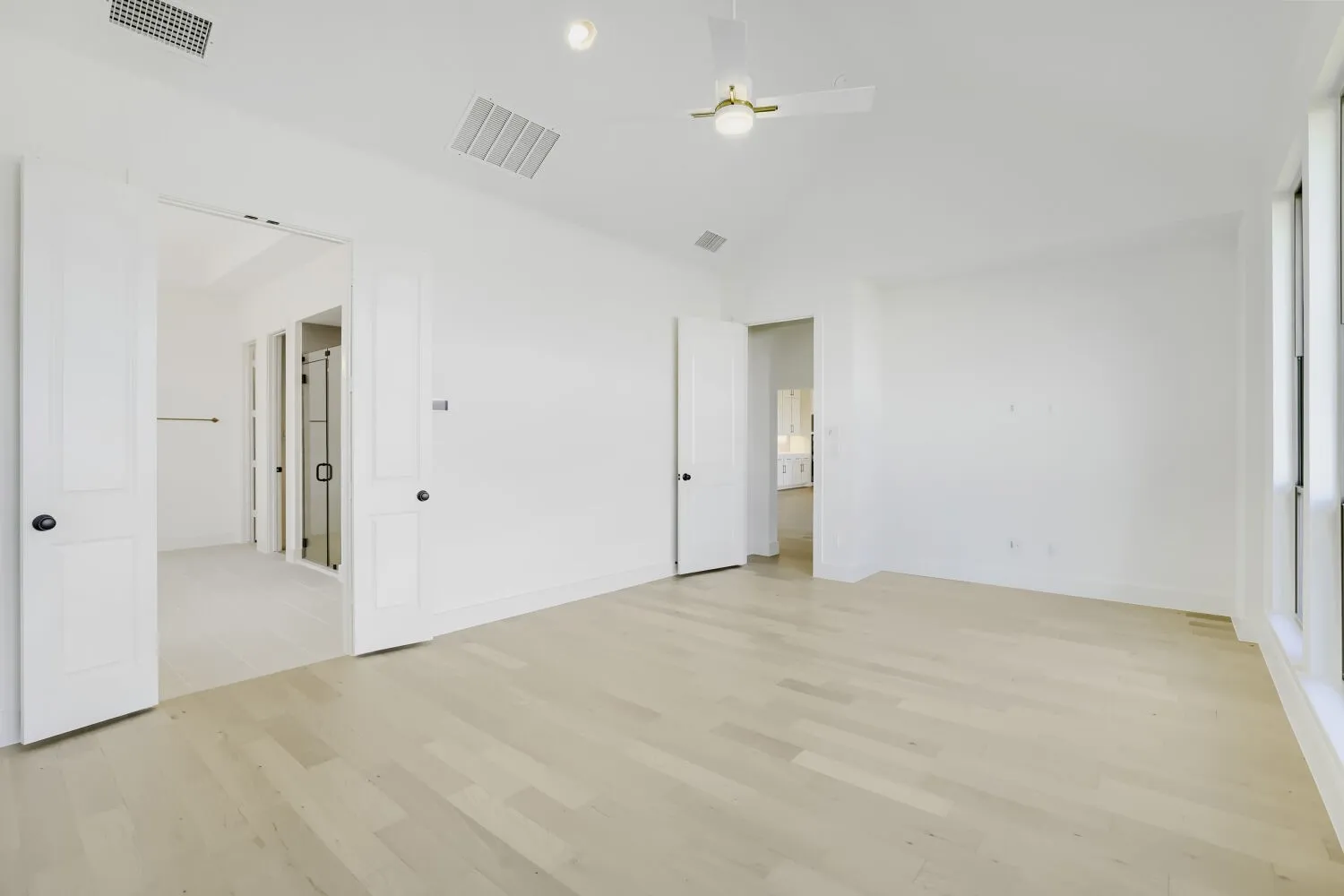 Vaulted ceiling with a contemporary ceiling fan