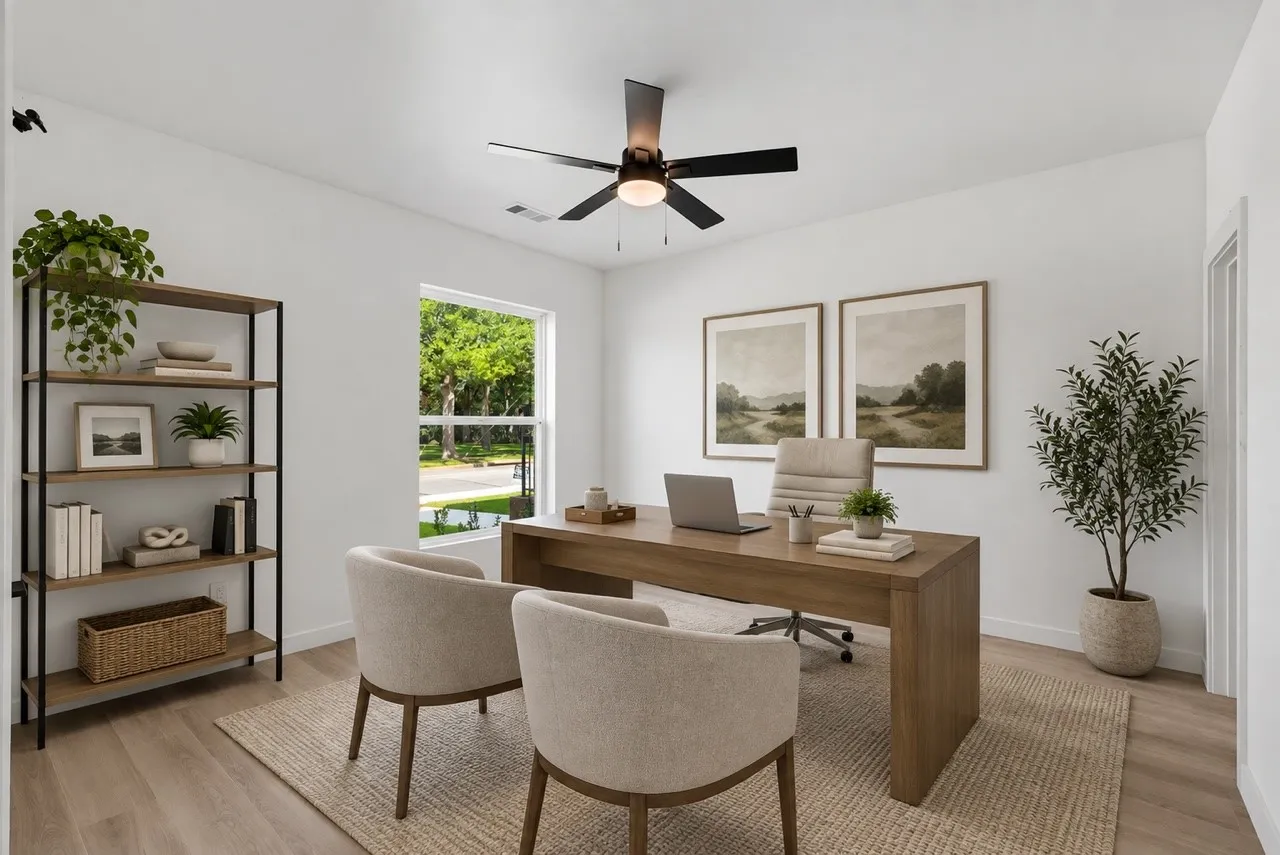 Bright interior with a large window, wood-finish flooring, and a ceiling fan