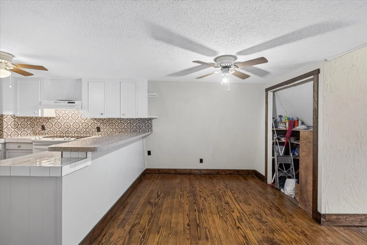Dining Area, the doors have been installed on pantry/storage