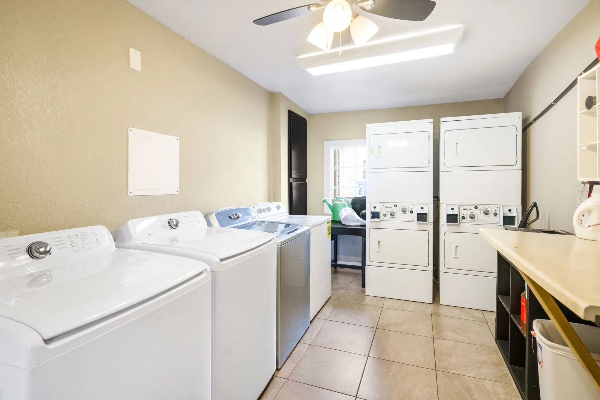 On-site laundry room equipped with four washers and dryers that will convey, offering a turnkey amenity for tenants and ease of management for the next owner.