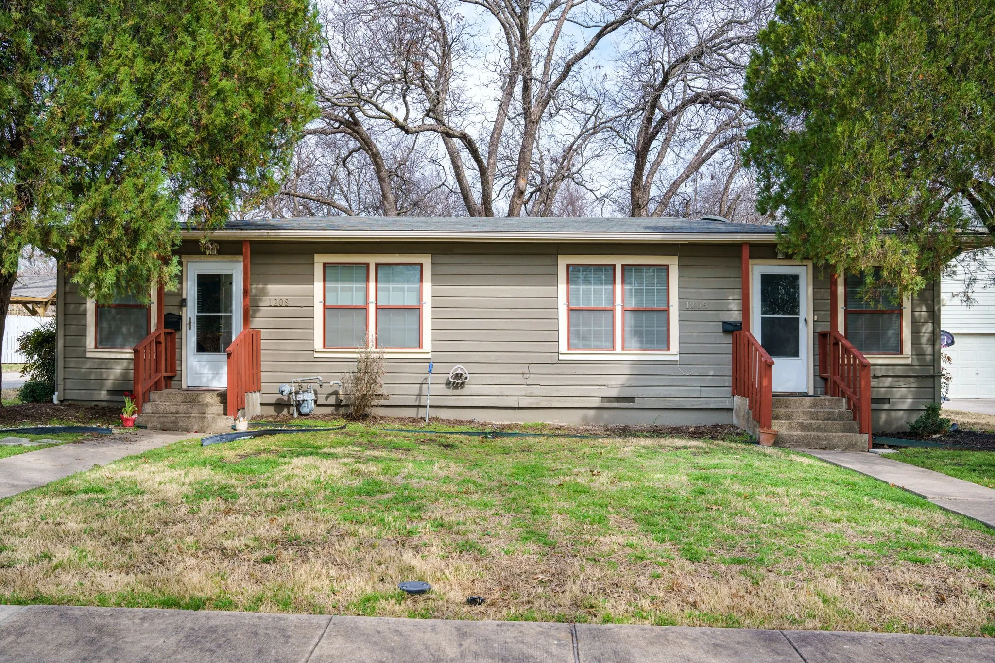 Featuring two apartments, convenient laundry facilities, and a dedicated office, this duplex provides a flexible space that supports both living and day-to-day operations.