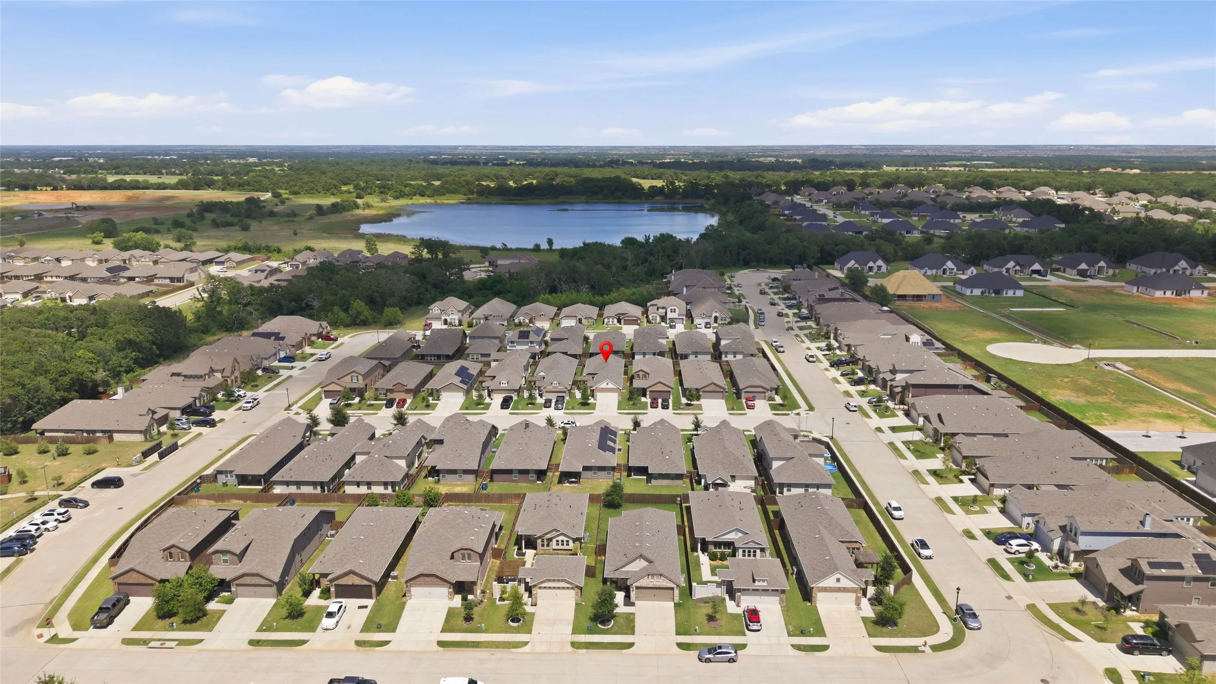 Aerial perspective showcasing a residential development with varied architectural styles
