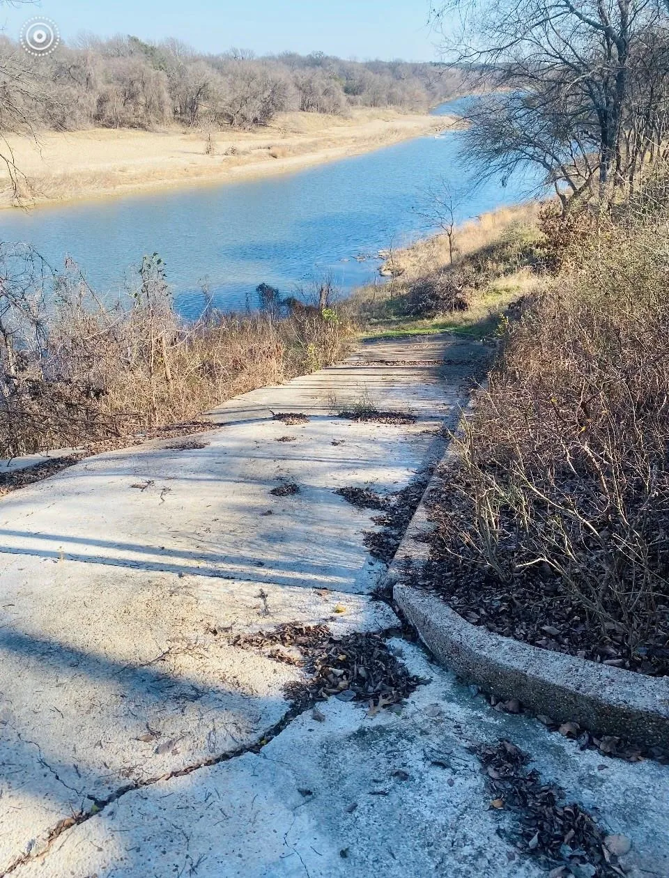 Concrete path descending to waterfront