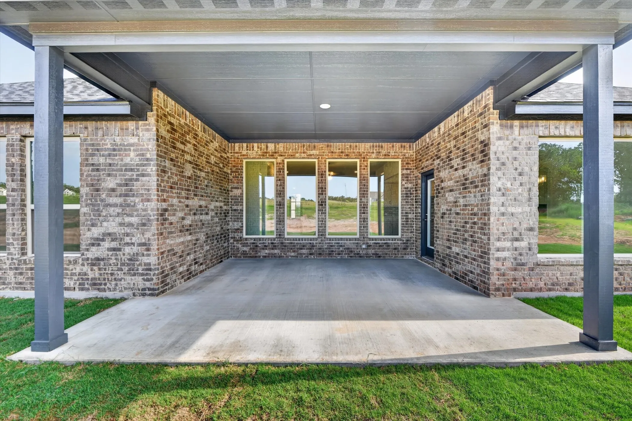 THIS IS AN AI RENDERING OF THE LOT WITH A PATIO EXTENSION AND SHOP - ASK ABOUT SHOP PAD INCENTIVES