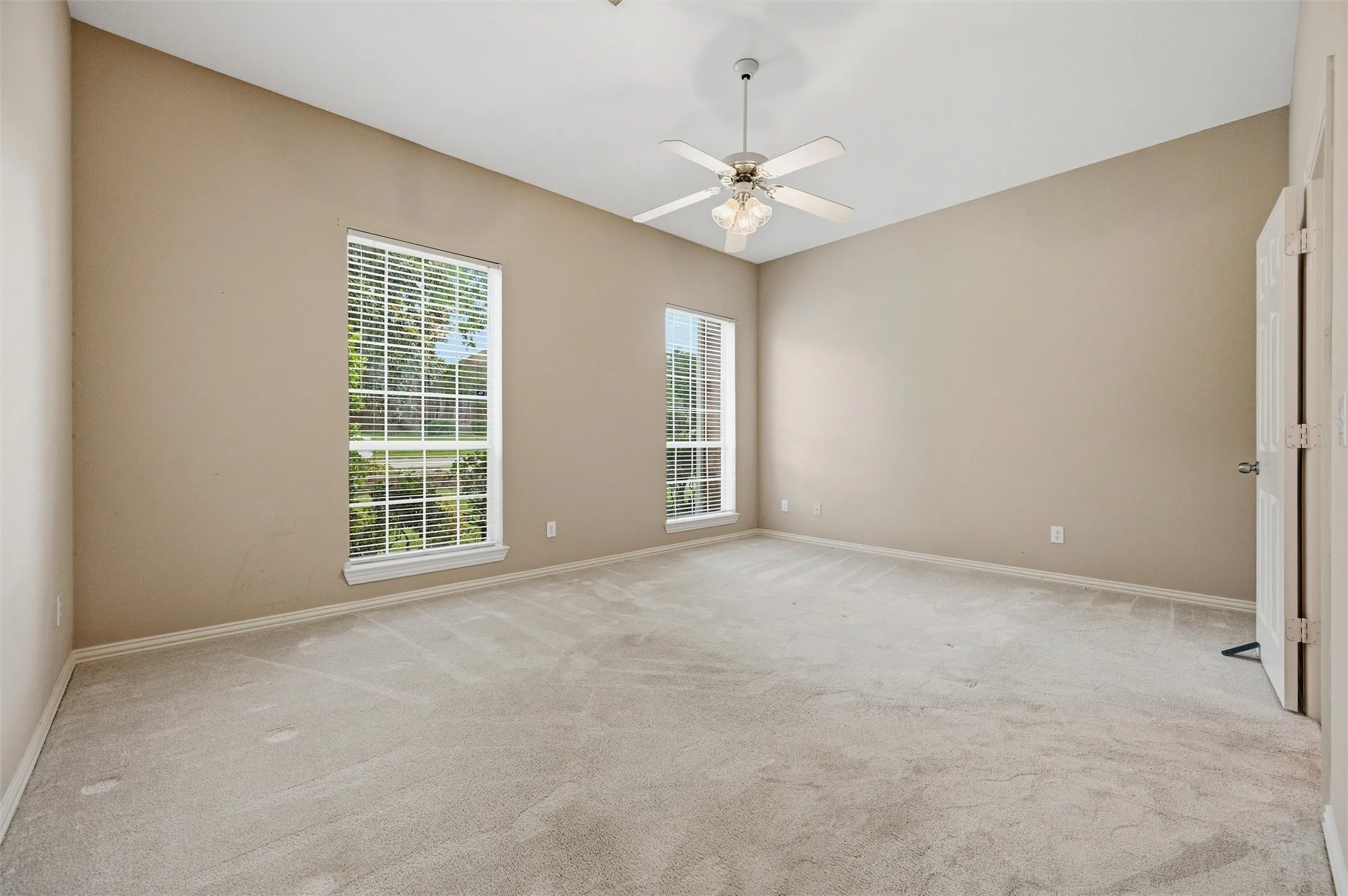 1st floor master suite with ensuite - view fronr yard