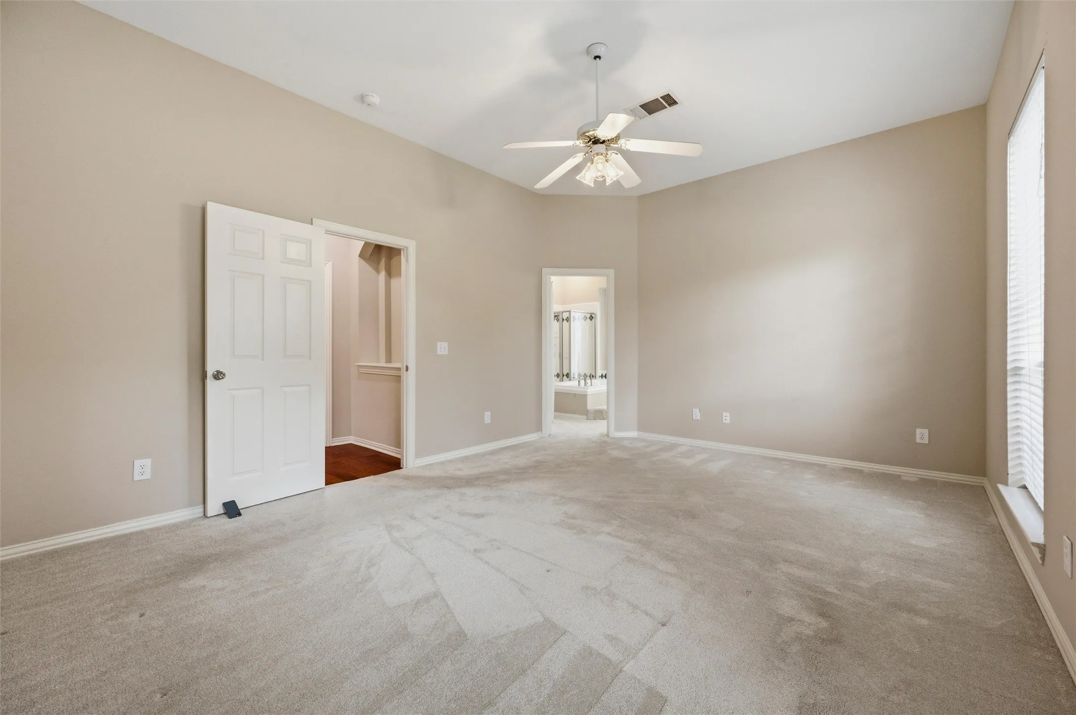 Doors to the bathroom, hallway - utility room is across from the bedrom on hall - so convenient
