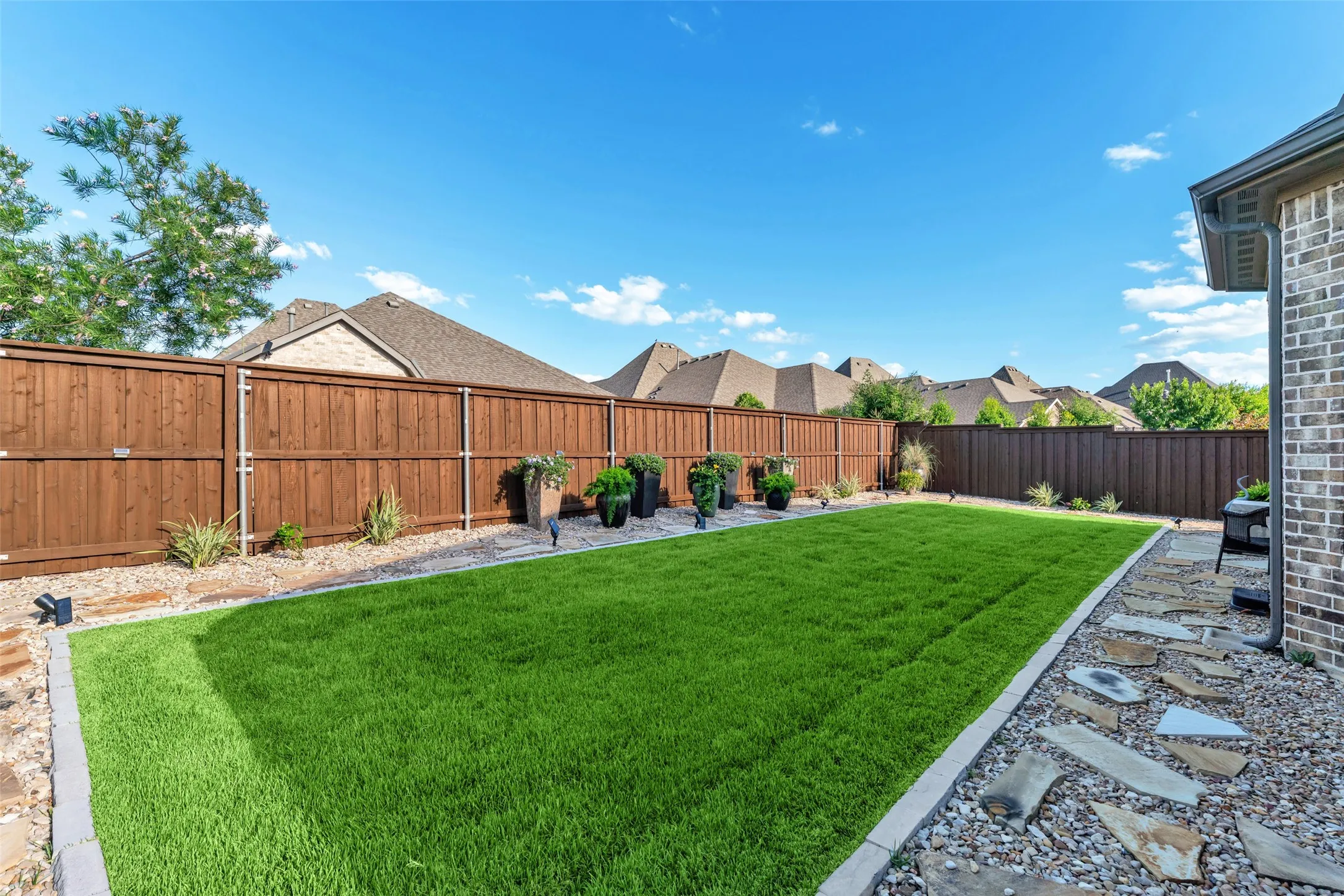 Lush lawn and beautiful landscaping