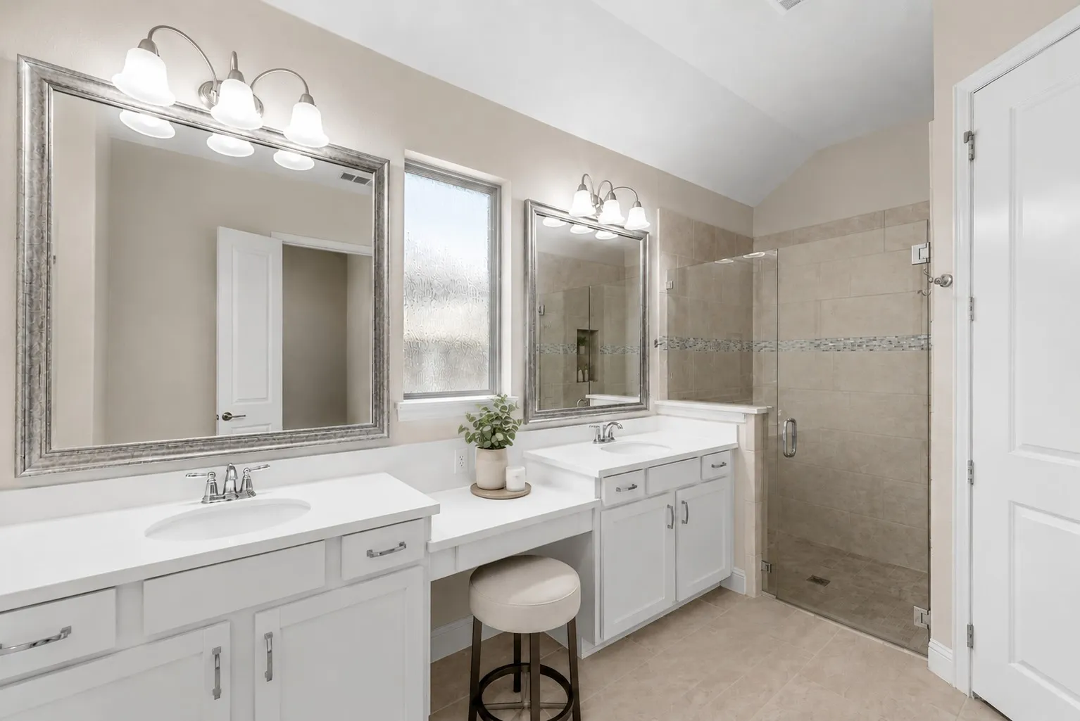 The primary bath features a large walk-in shower and closet!