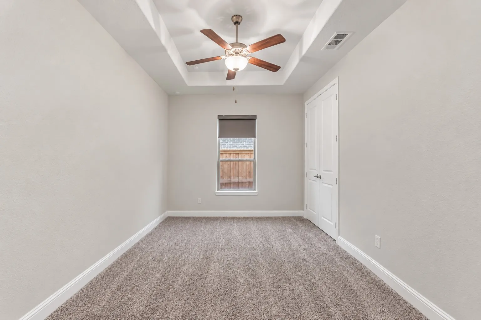 Dedicated home office provides a quiet workspace and flexible use for remote work or hobbies.