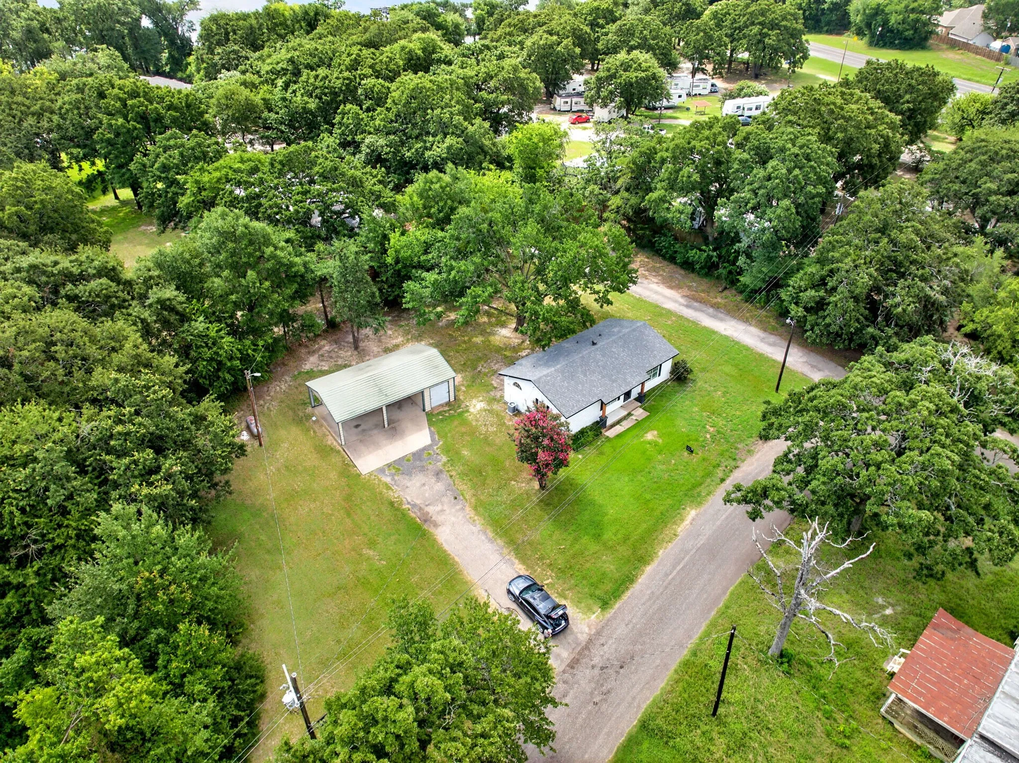 Single Family Residence For Sale in Hunt County , 10302 County Road 3705, Quinlan, Texas 75474, 3 Bedroom, 2 Bathroom, Garage spaces, 1,056 Sqft, built in 1977, mls#21302627, Real Estate Agent in Quinlan, Homes For Sale in Hunt county, Homes For Sale in Quinlan, Realtor in Quinlan Texas, Real Estate Brokerage Independent Realty Texas, Luminita Cordes Realtor
