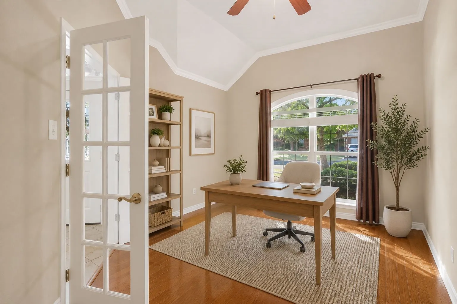 Very large open office area with bright windows and double french doors for privacy and quiet. Virtually staged