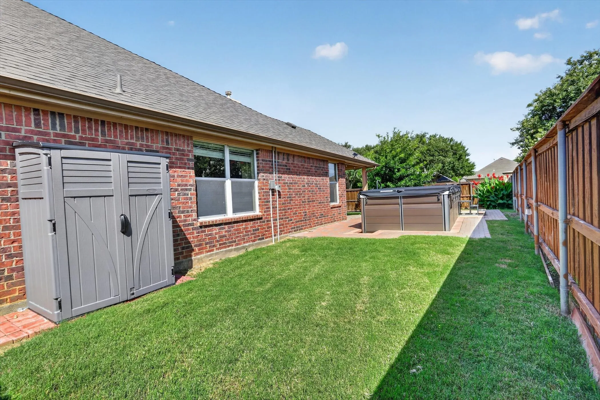 storage shed for yard and pool tools and huge side yards for the pups!