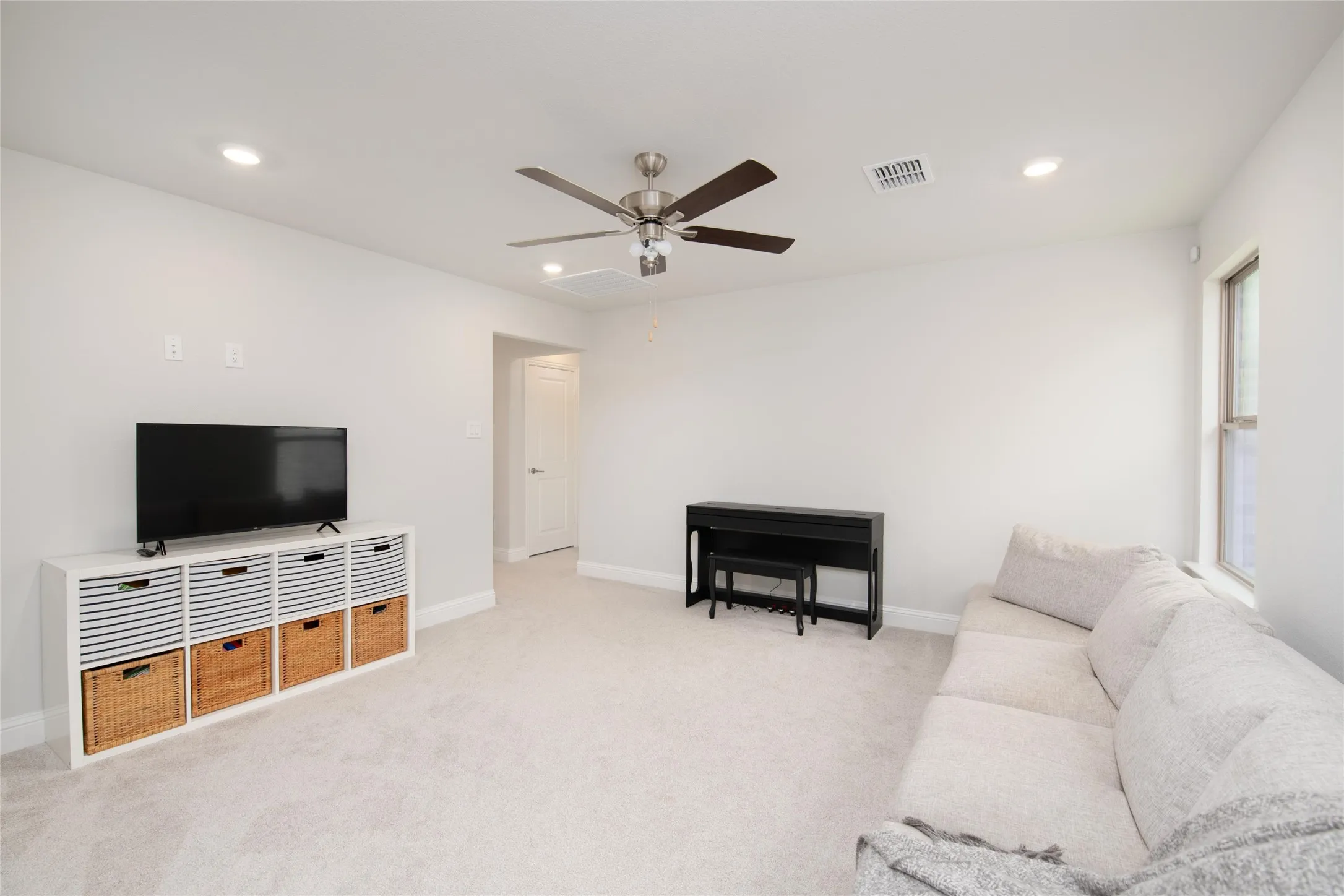 Large enough to accommodate multiple seating and activity zones, this versatile space creates the ideal destination for family fun and entertaining.