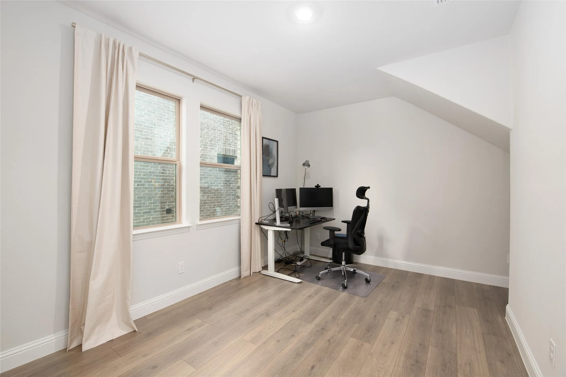 Whether working remotely or managing daily tasks, this dedicated home office offers a quiet and productive workspace tucked away from the main living areas.