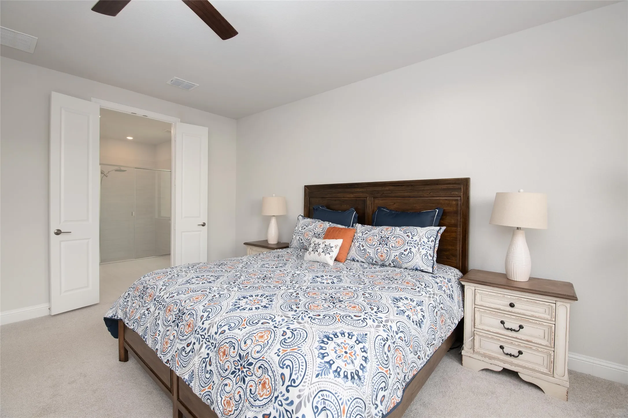 Primary Designed for comfort and relaxation, the extended first-floor owner's retreat offers exceptional space, natural light, and a private escape at the end of the day.
