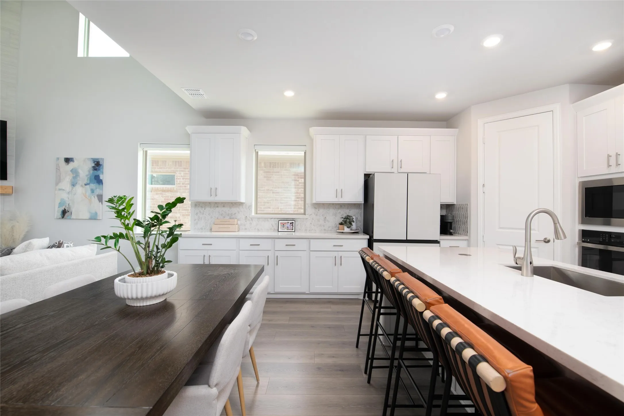 Whether hosting a crowd or enjoying a quiet evening at home, the open floor plan offers exceptional flow between the kitchen, dining, and living spaces.