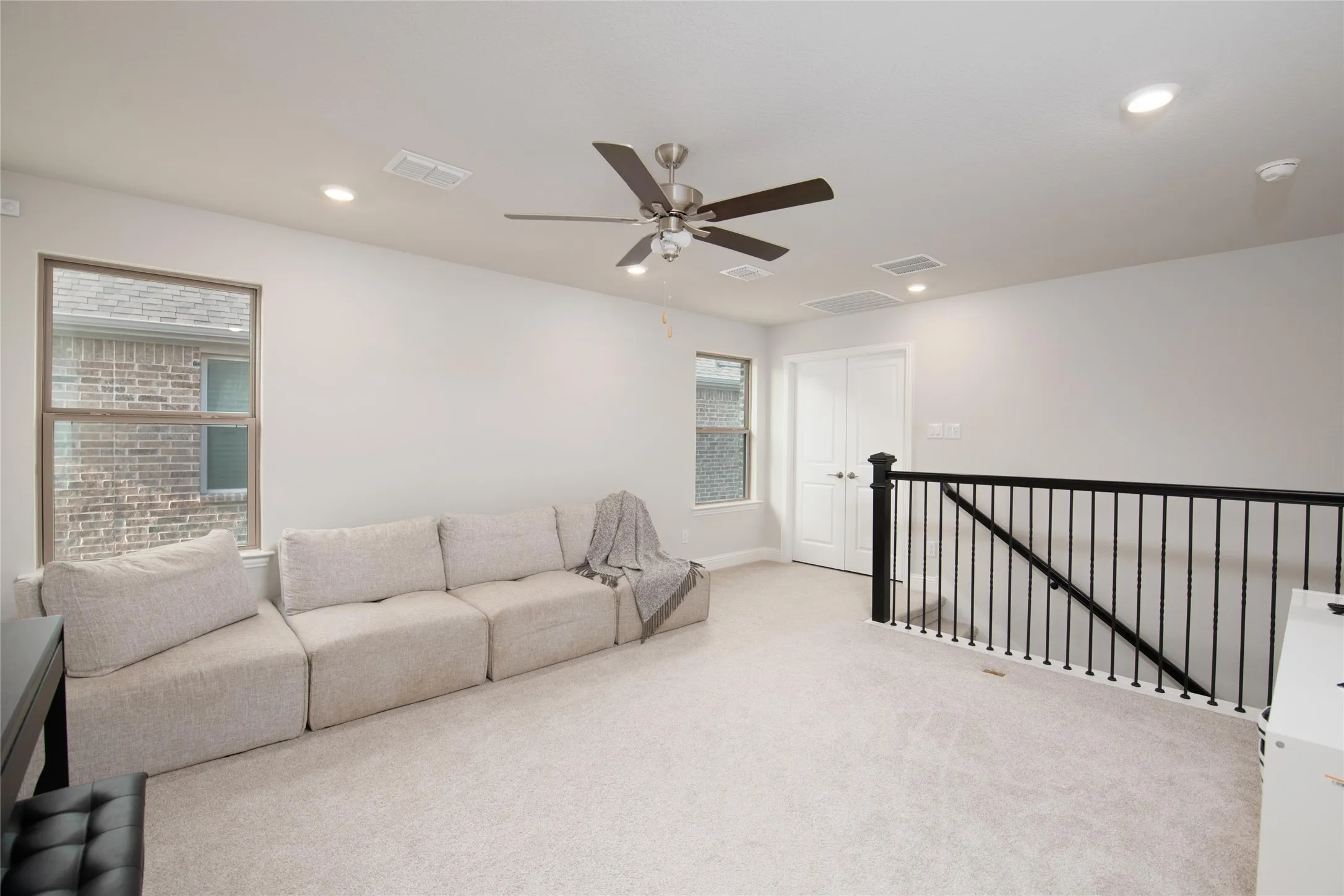 Game RoomOffering a perfect retreat from the main living areas, this expansive second-floor game room provides endless possibilities for movie nights, gaming, hobbies, or casual gatherings.