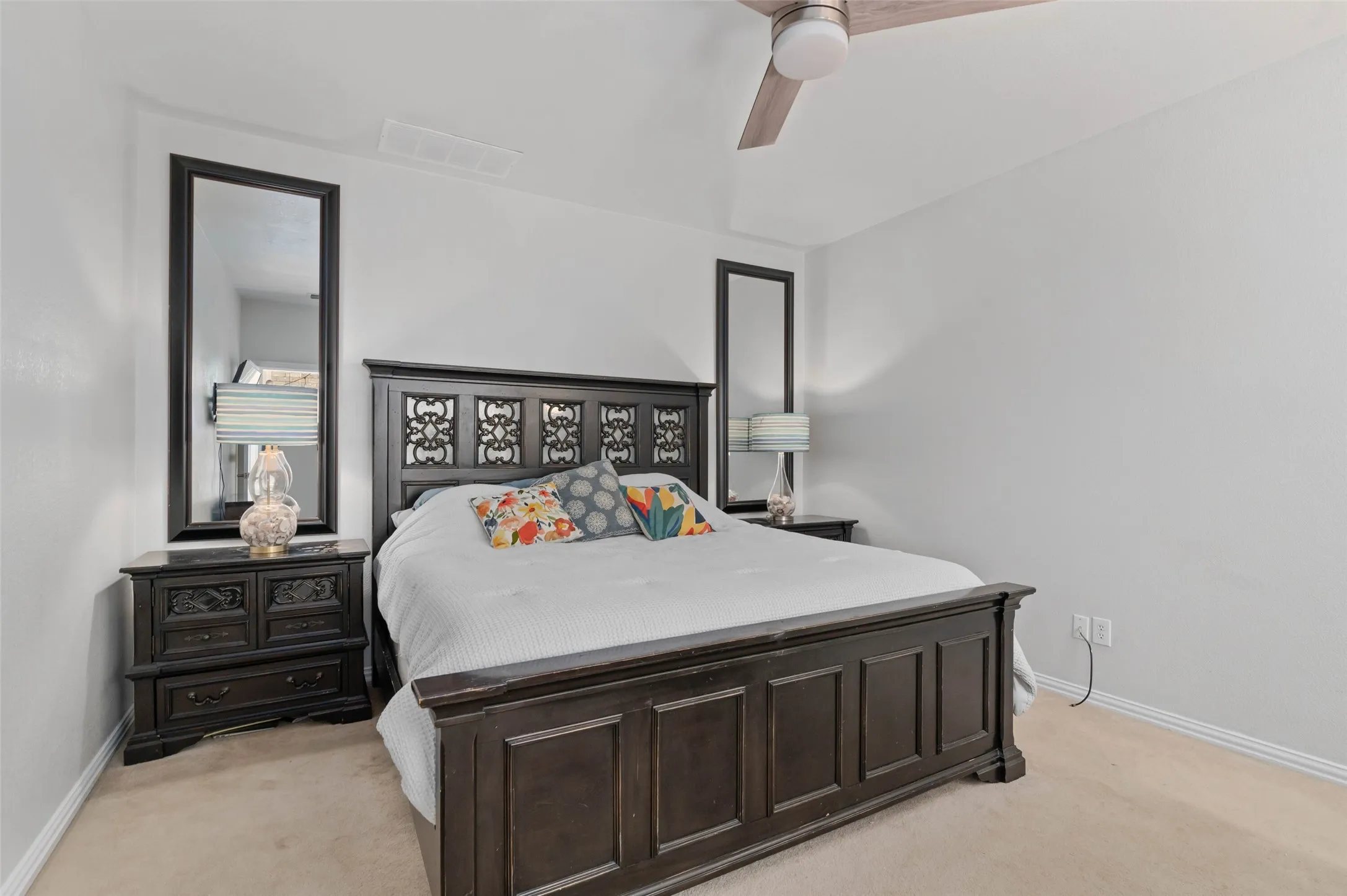 Bedroom featuring carpeted flooring, a ceiling fan, white walls, and white baseboards
