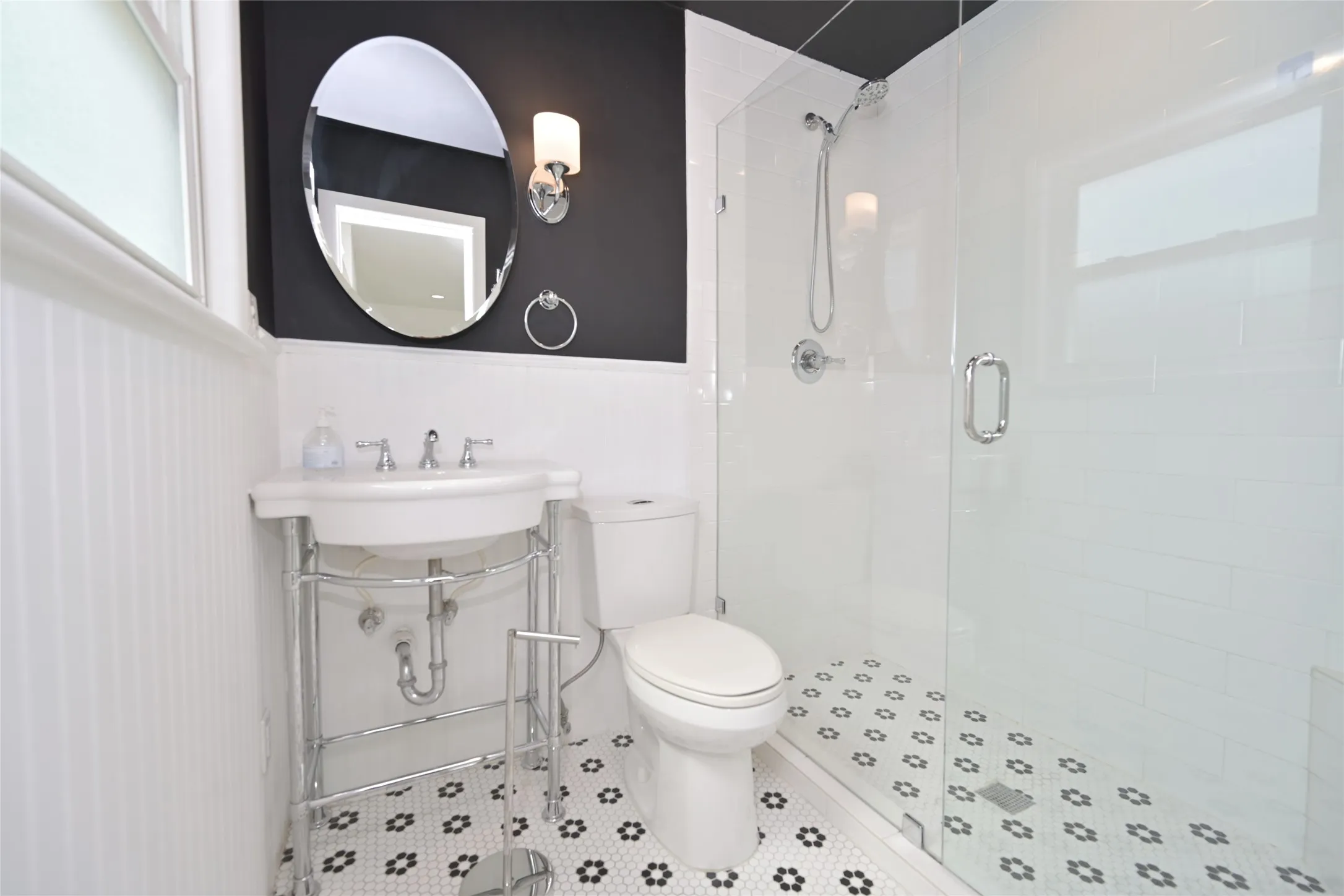Updated Bathroom with large rimless shower