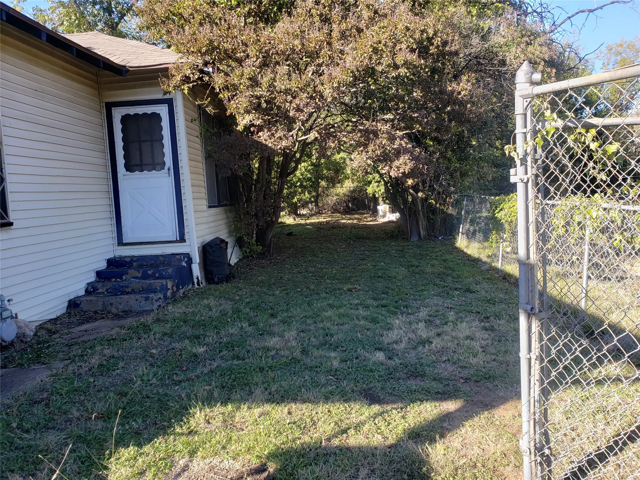 View of yard featuring entry steps