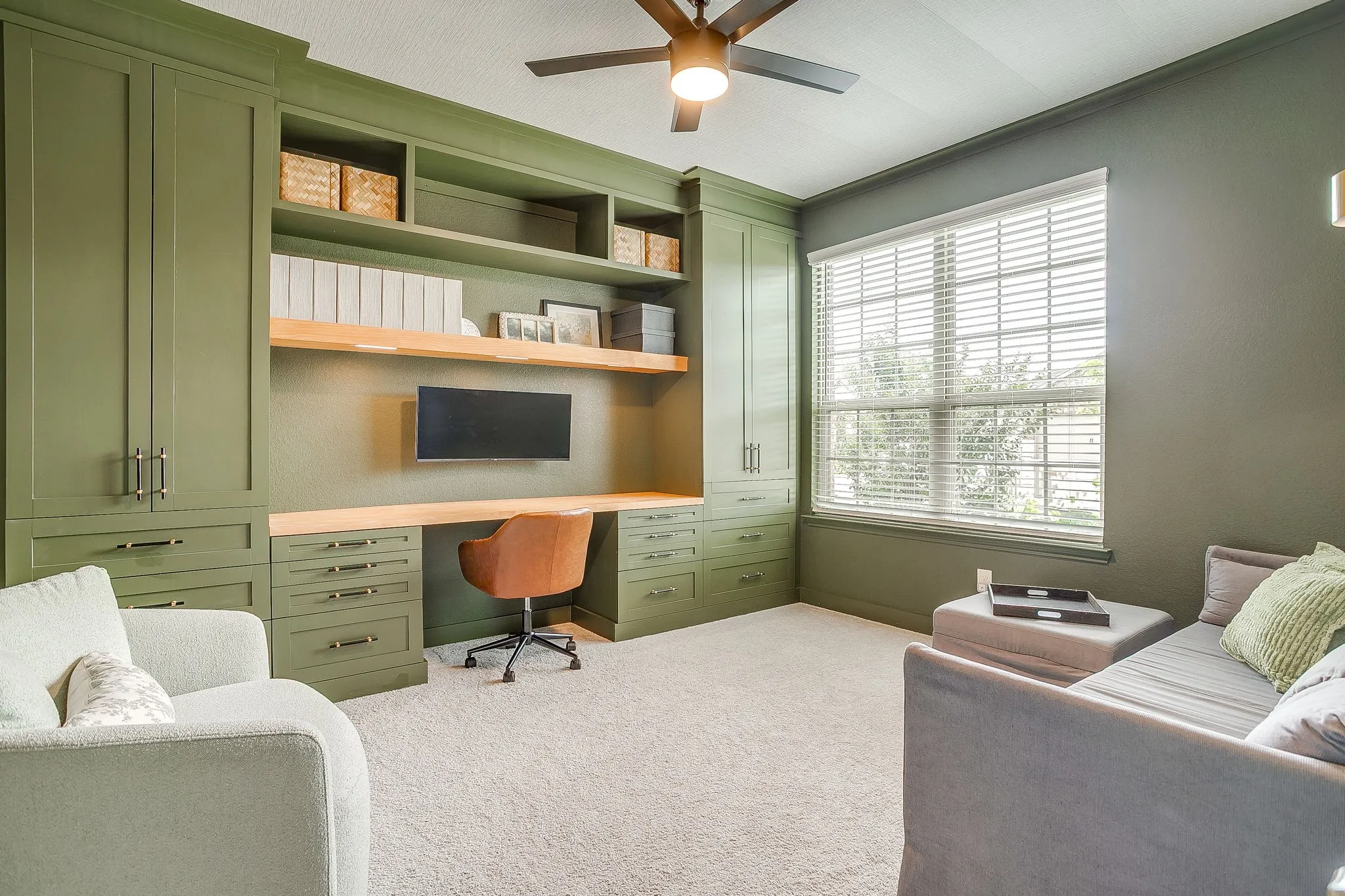 Office is color drenched with the perfect shade of green plus wallpapered ceiling.