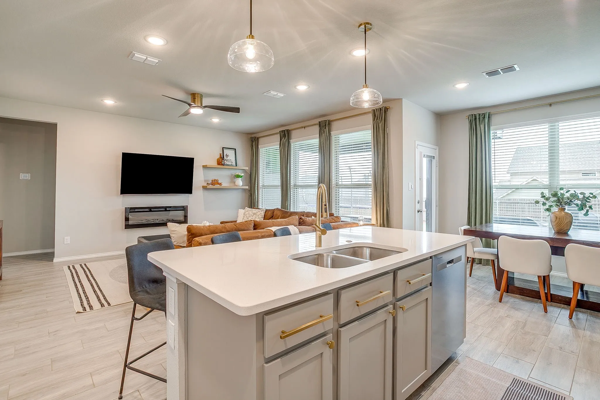 Dual basin stainless sink plus stainless steel appliances.
