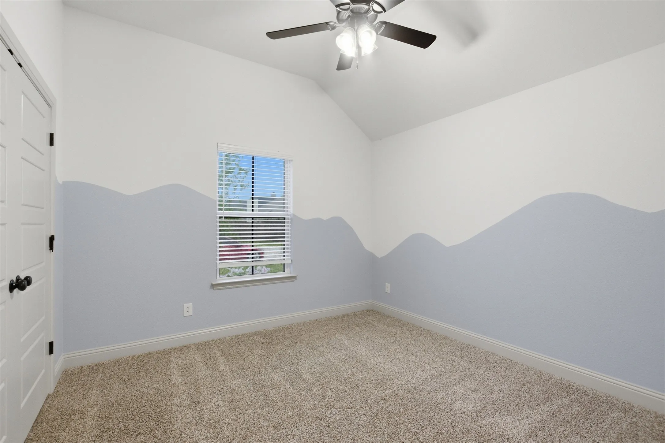 Secondary Bedroom 2 with custom paint, carpet, ceiling fan