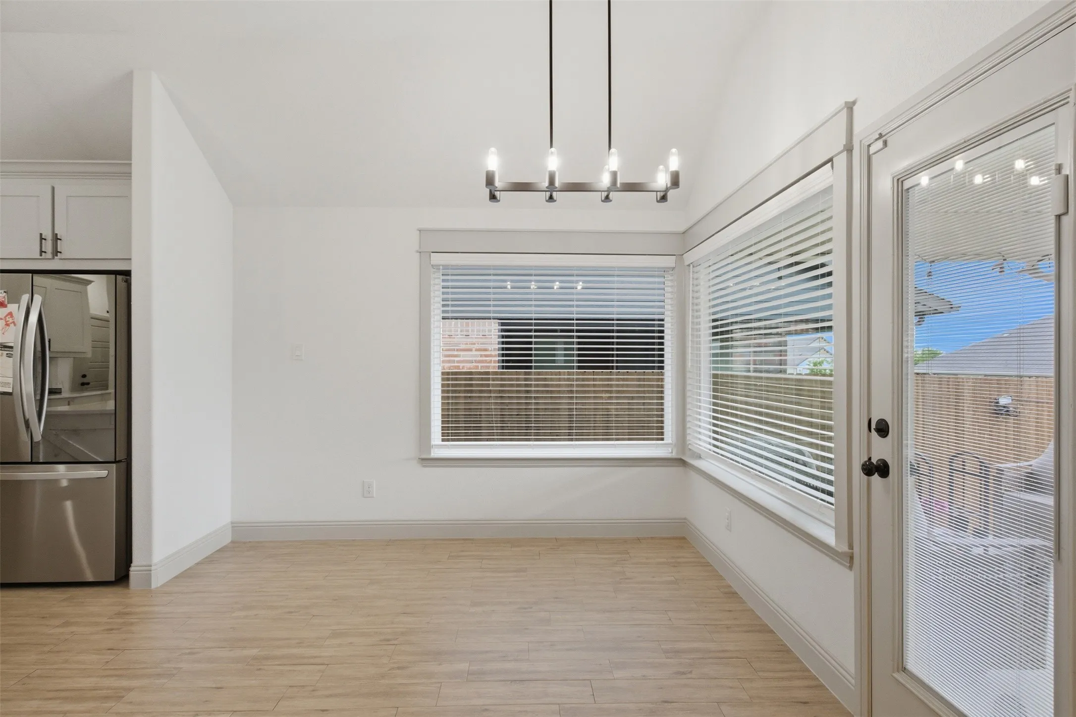 Dining area with natural light through your picture windows!