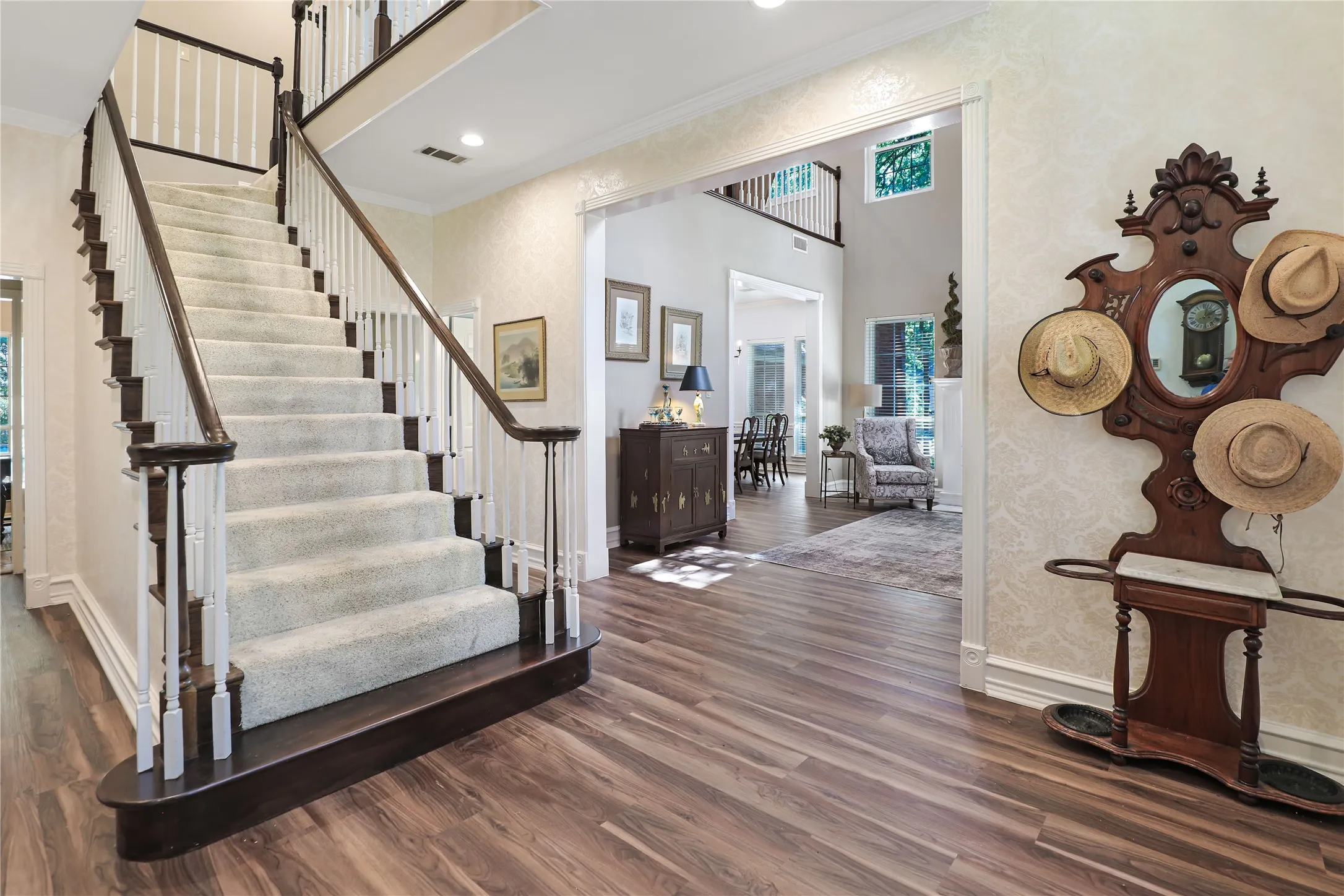 Stairway to second floor from den