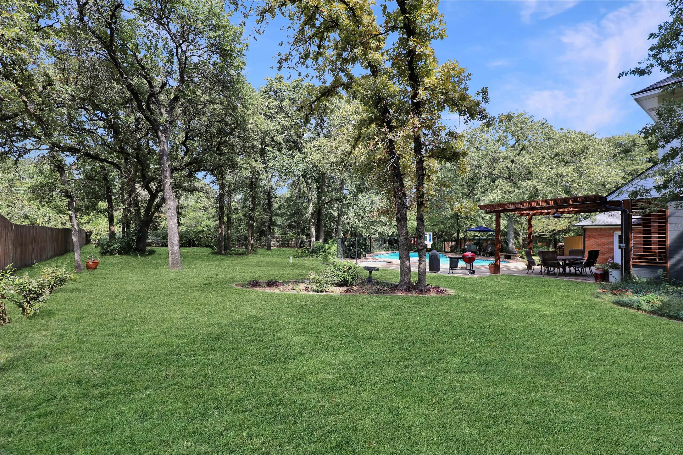 View toward pool from side yard.