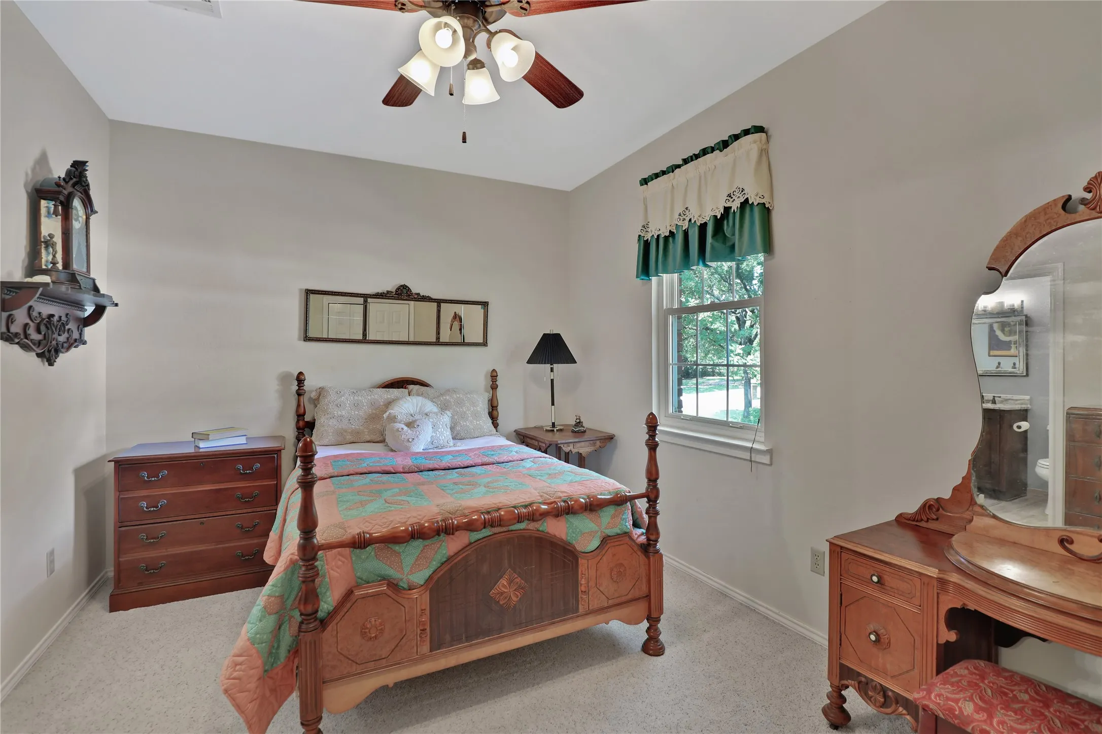 Second floor bedroom #2 with walk-in closet and ceiling fan