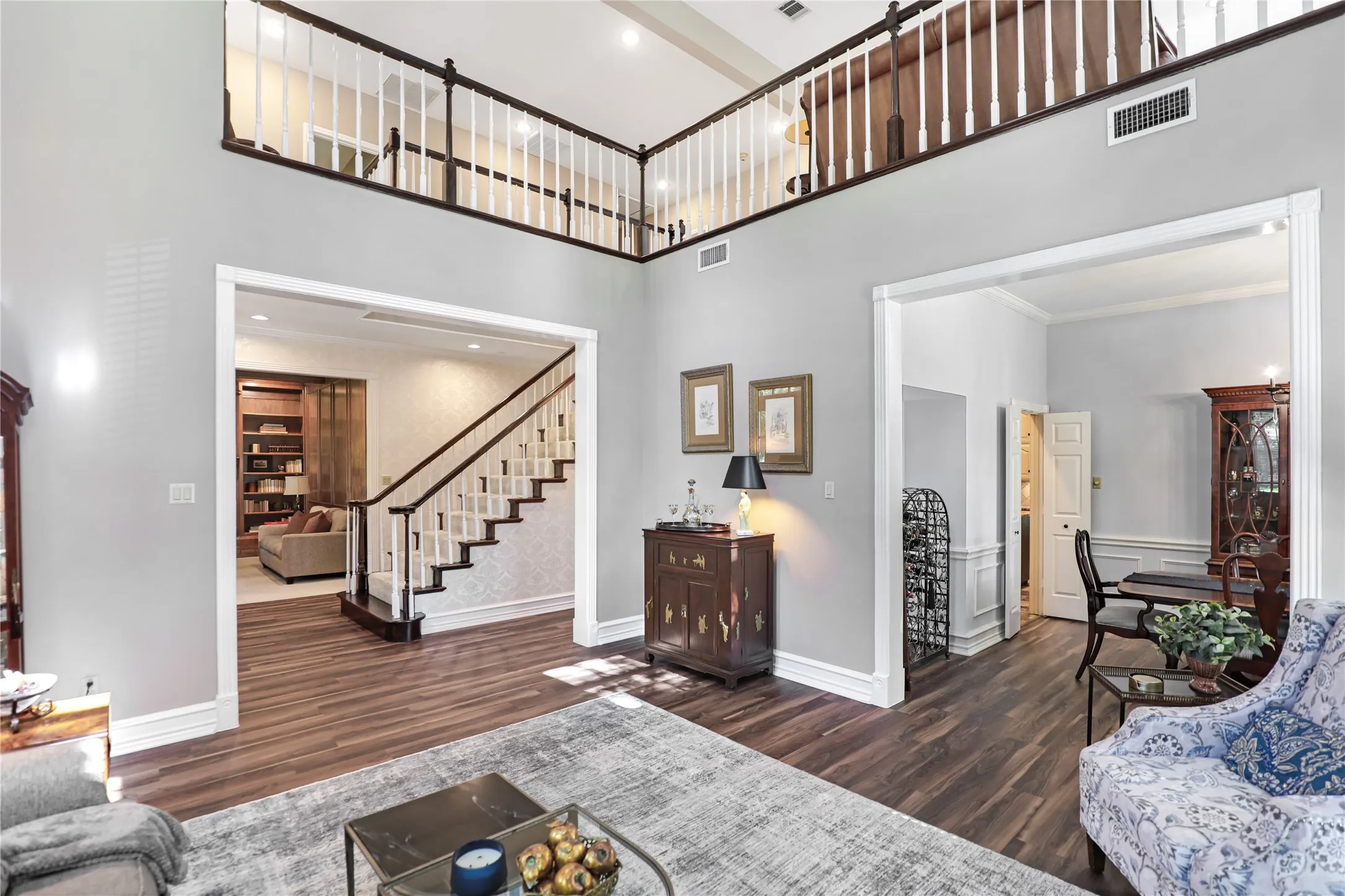 View from living room toward entry foyer and second level