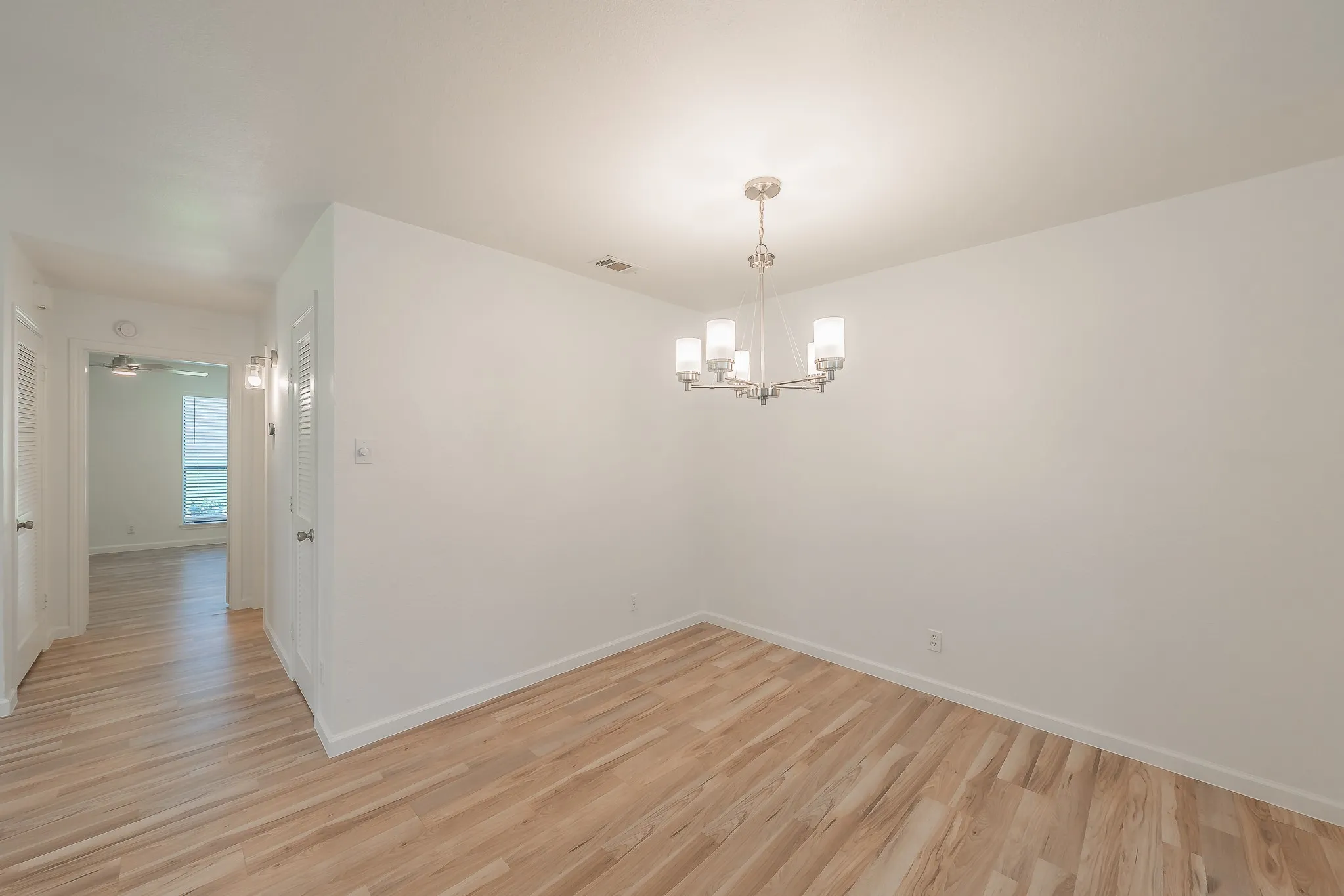 Dining area with new chandalier