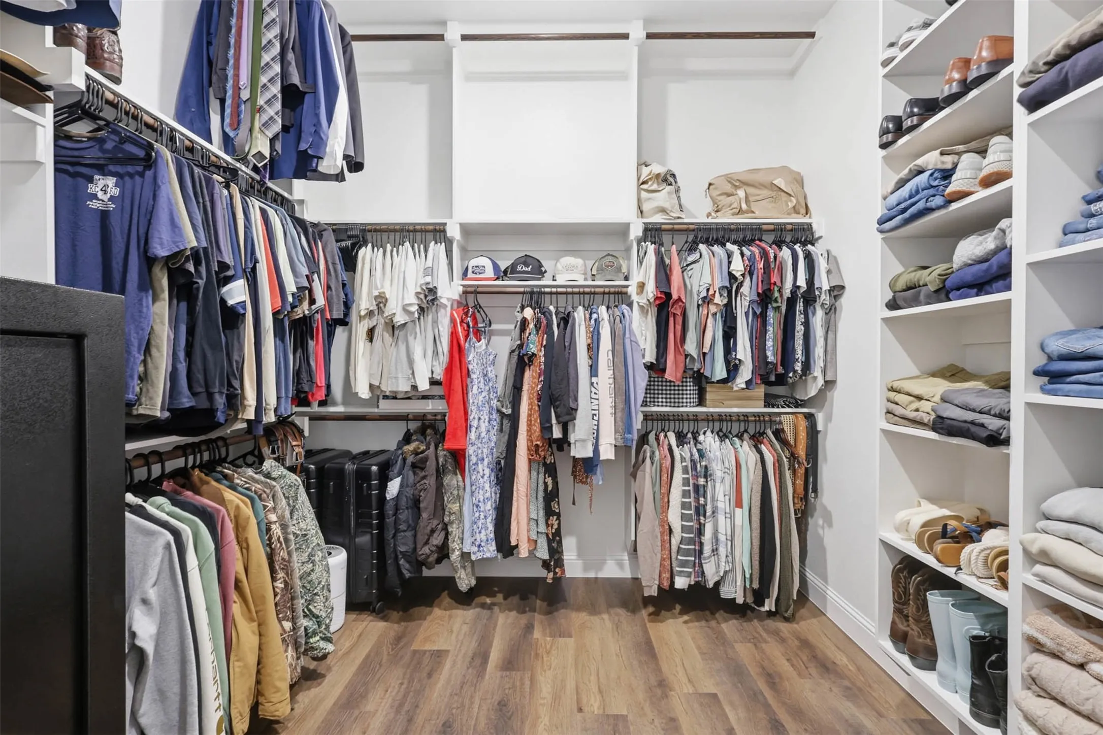 Primary closet with 3 tier seasonal storage