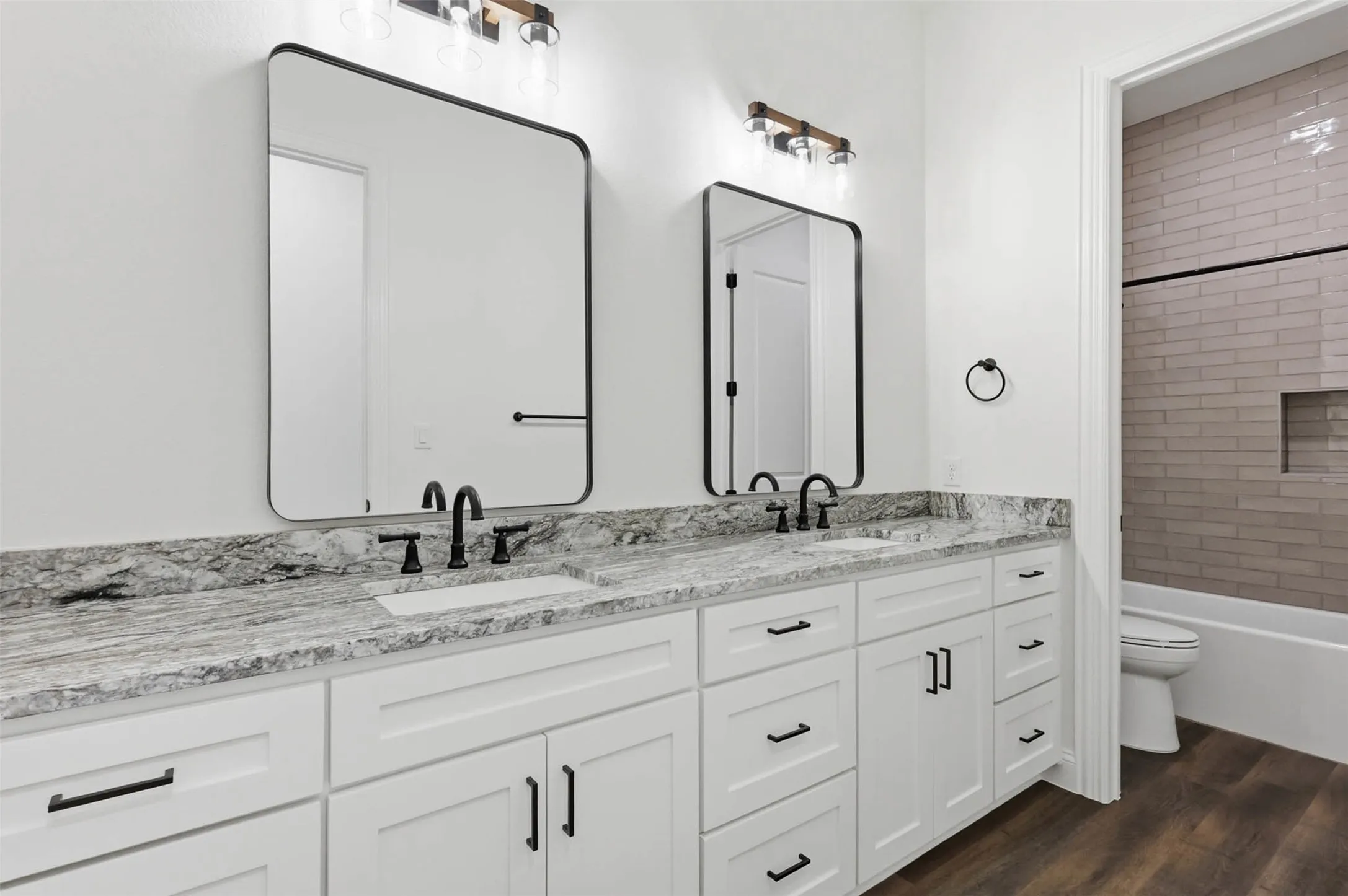 Secondary bathroom with dual sinks