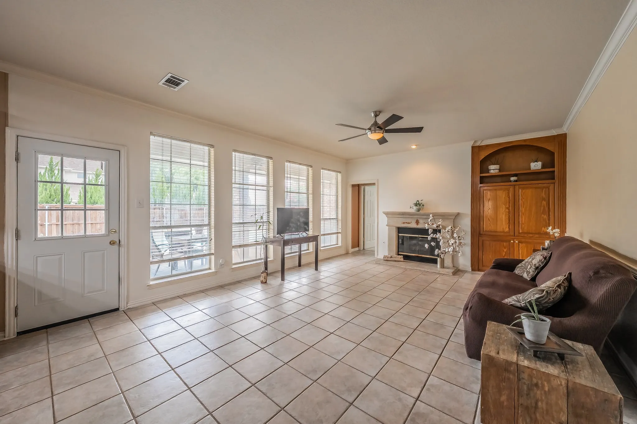 Family Room with built in cabinet and gas fireplace.