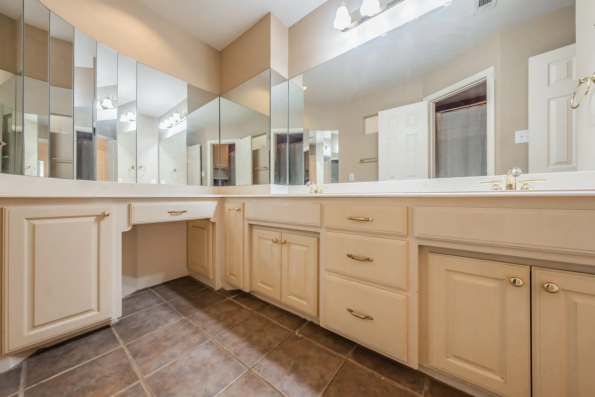 Upstairs full bathroom for the secondary bedrooms.  Lots of cabinets and a vanity.