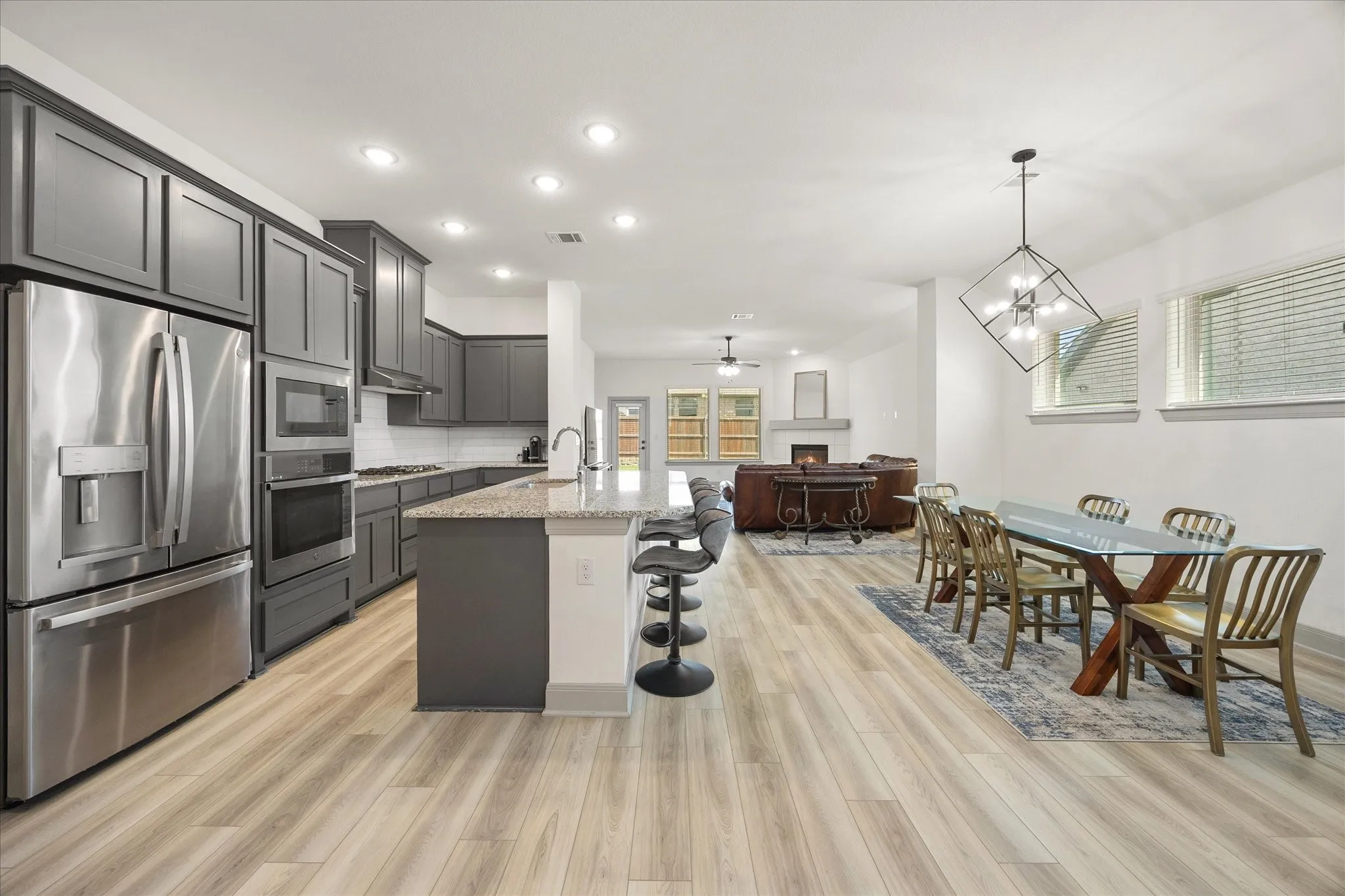 Open floor plan features dream kitchen opening onto dining area and family room