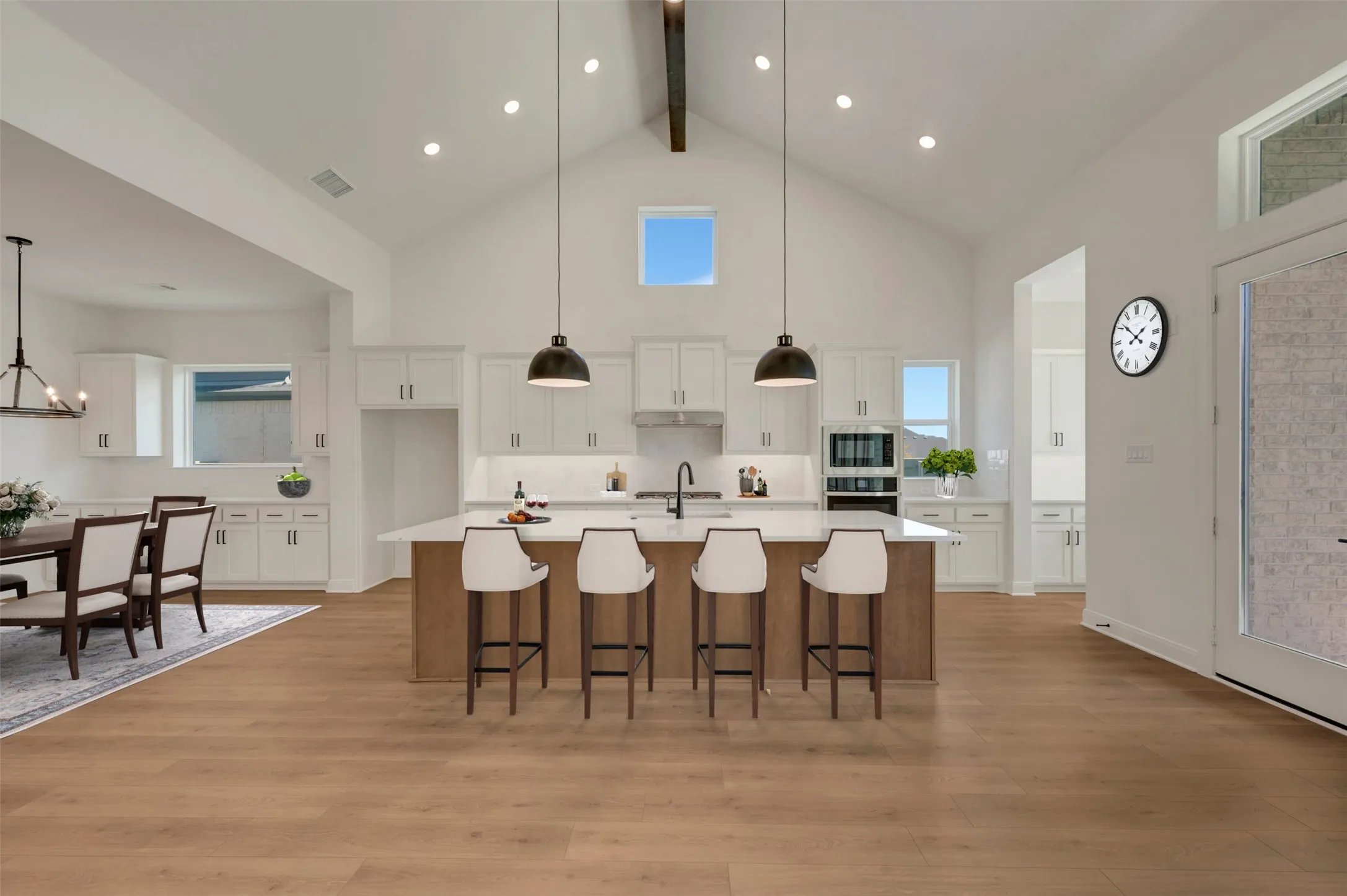 Vaulted ceilings with exposed beam detail