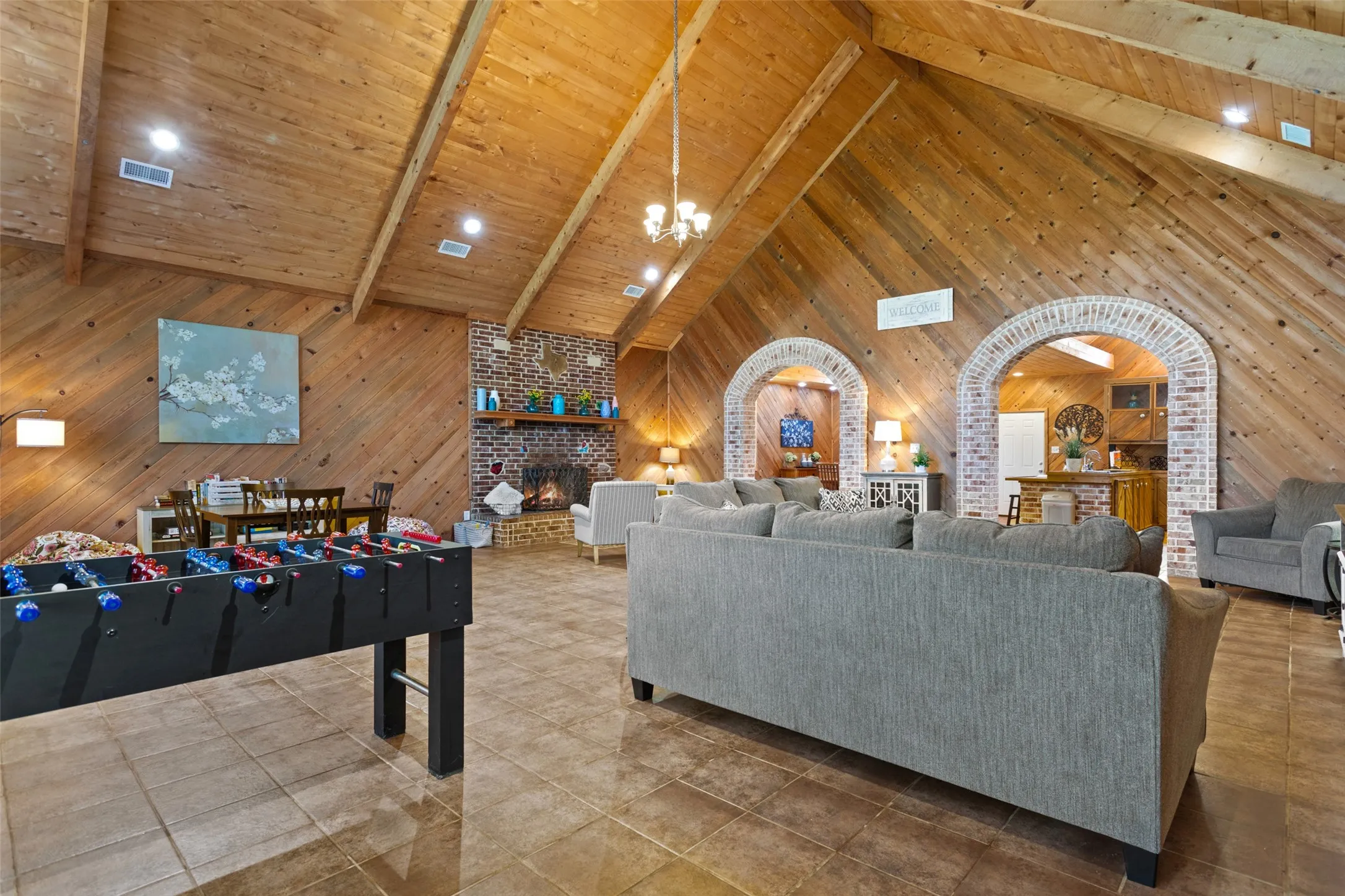 Vaulted wood-paneled ceilings with exposed beams