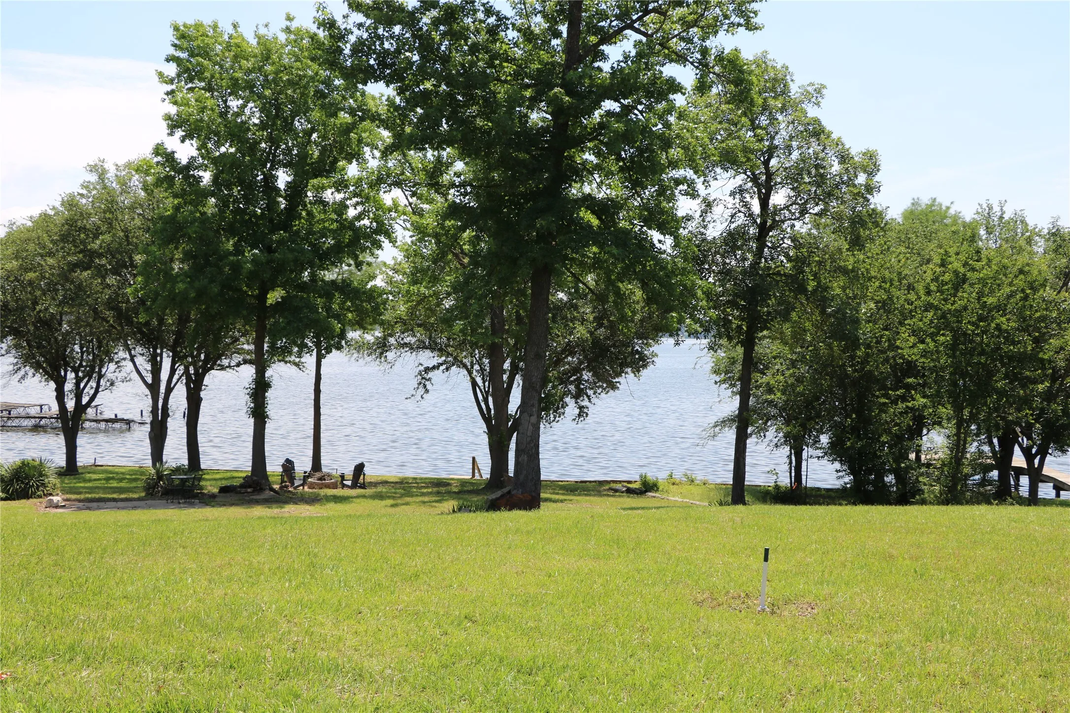 Waterfront with mature trees.