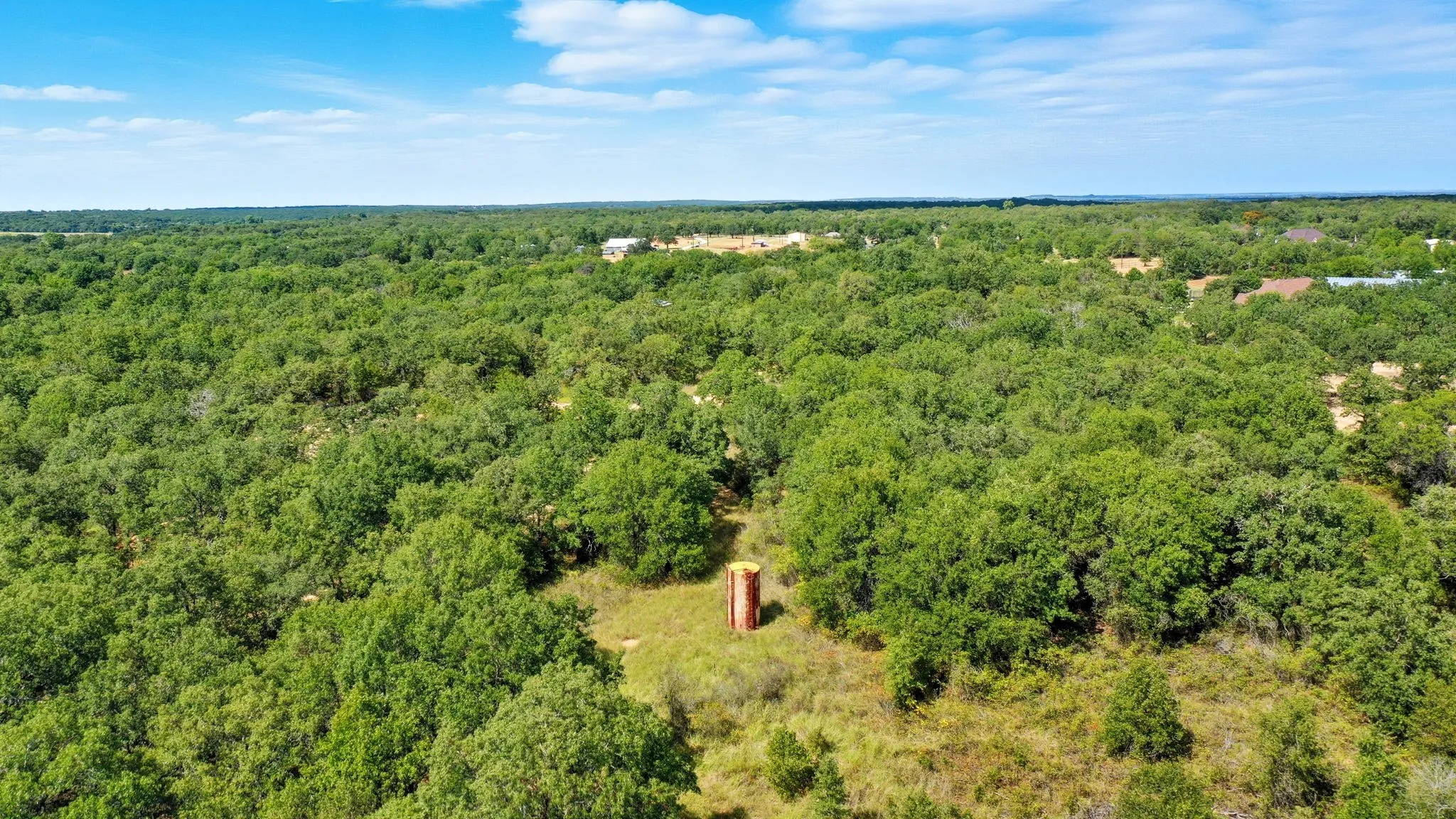 Drone / aerial view of a heavily wooded area