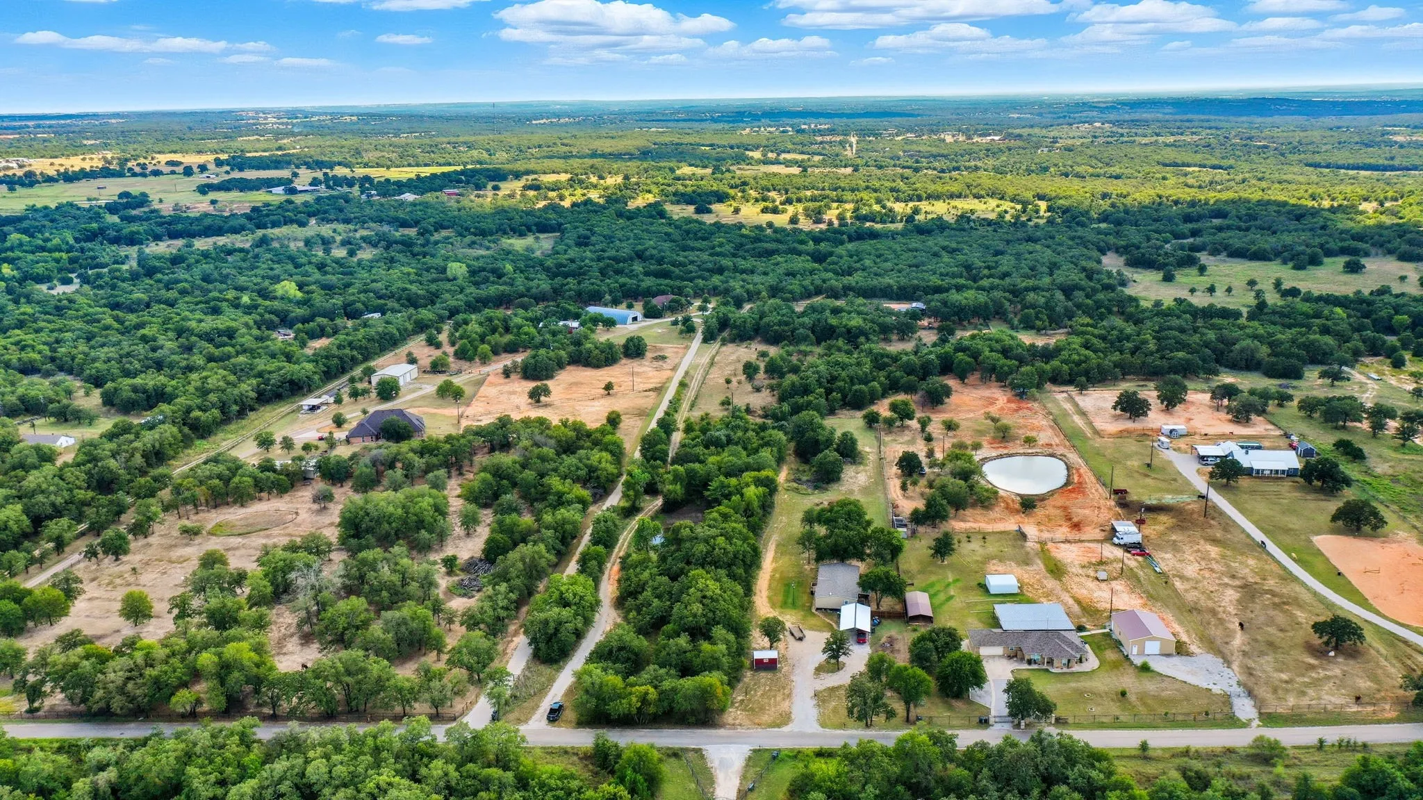 Aerial overview of property's location featuring rural landscape