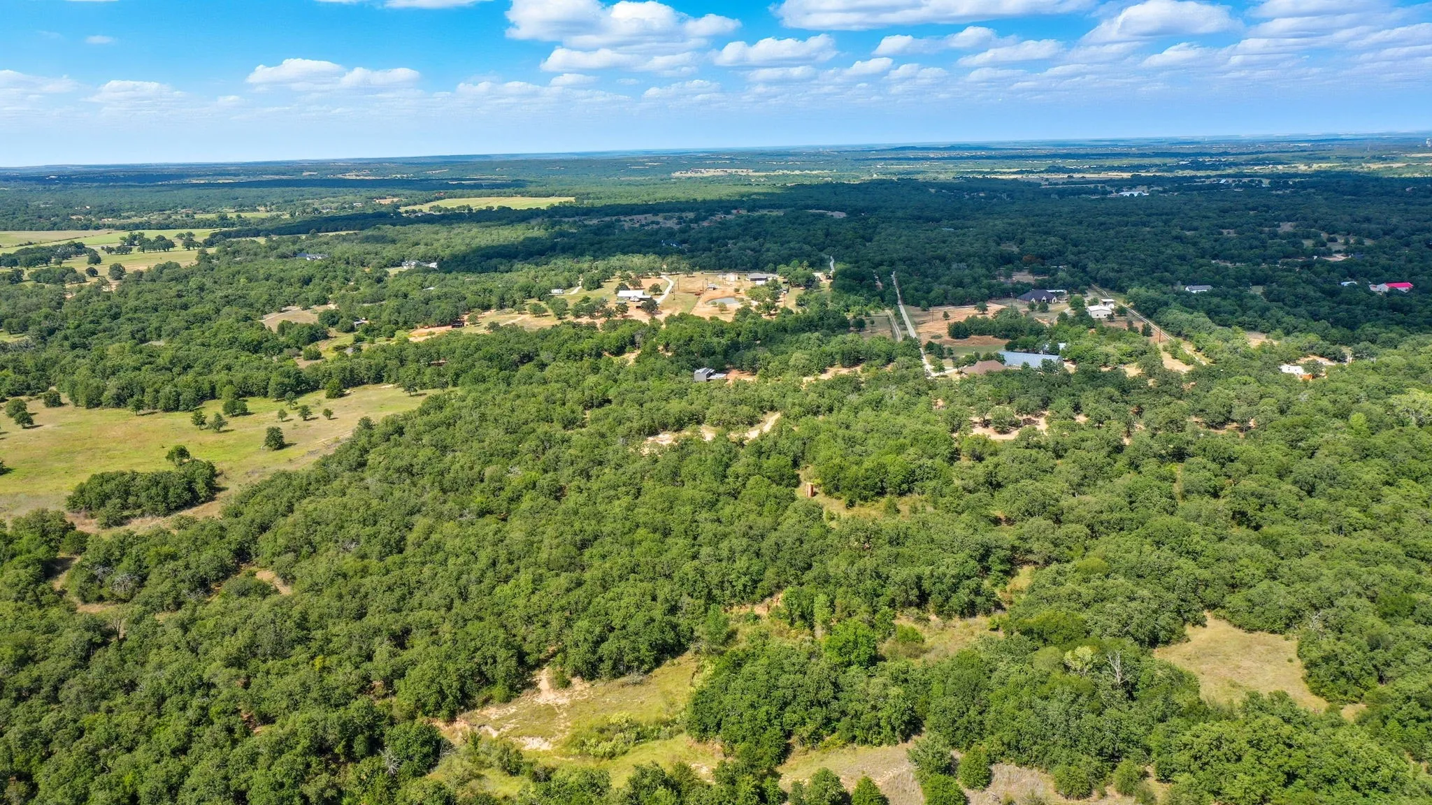 Aerial view of a heavily wooded area