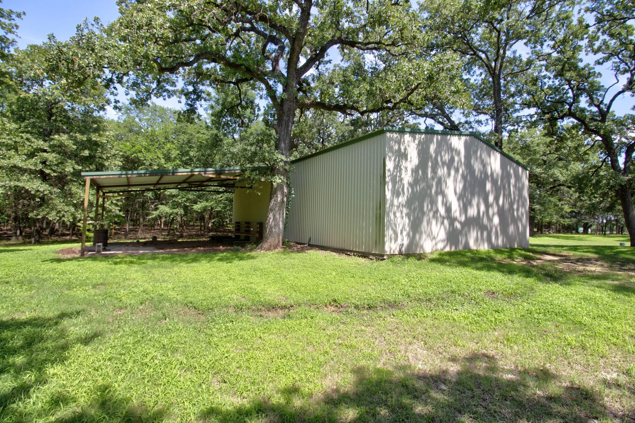 View of shop with a covered area perfect for relaxing and entertaining friends and family!