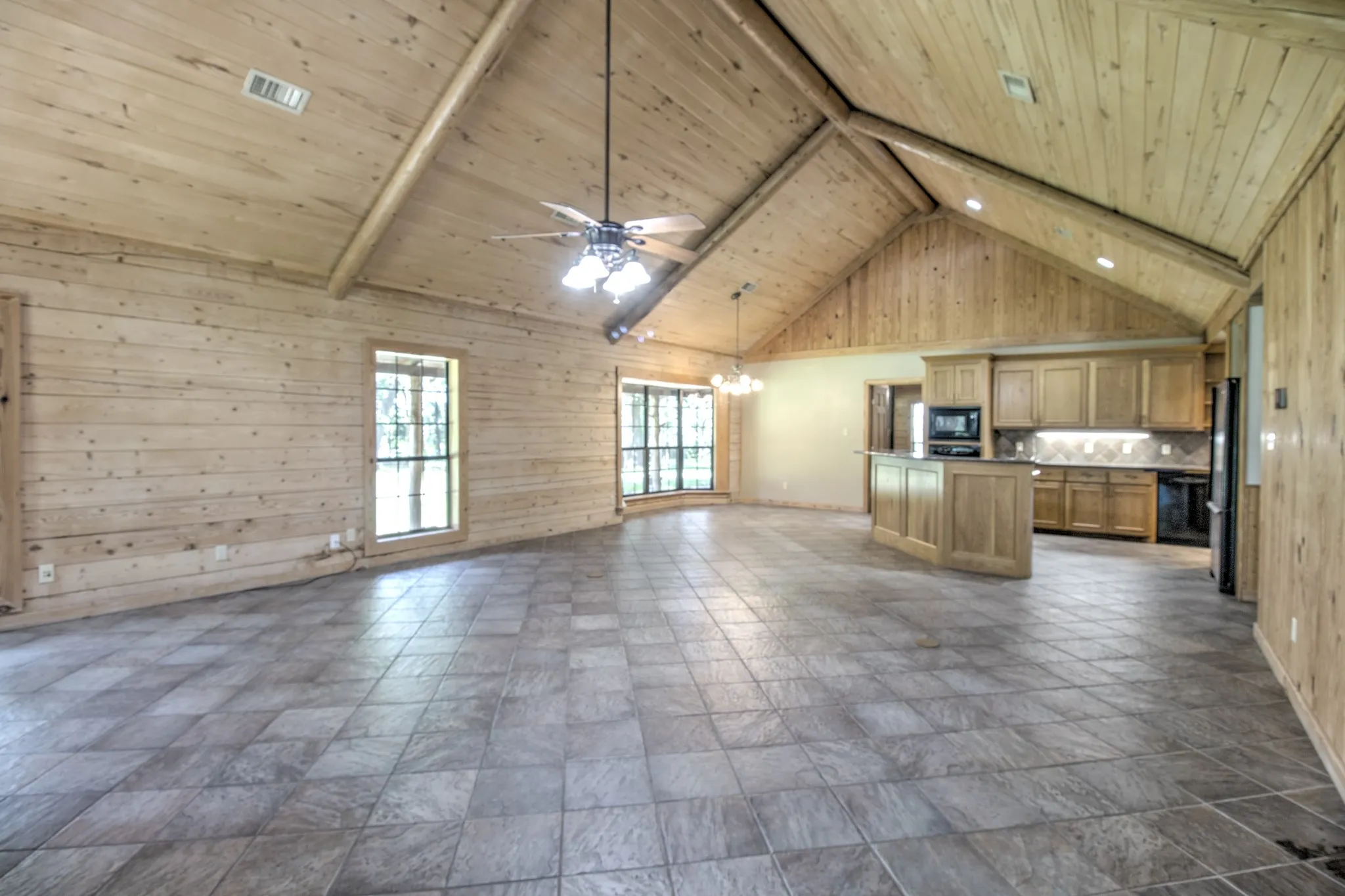 Open concept, Living room seamlessly flows into the Dining and Kitchen.